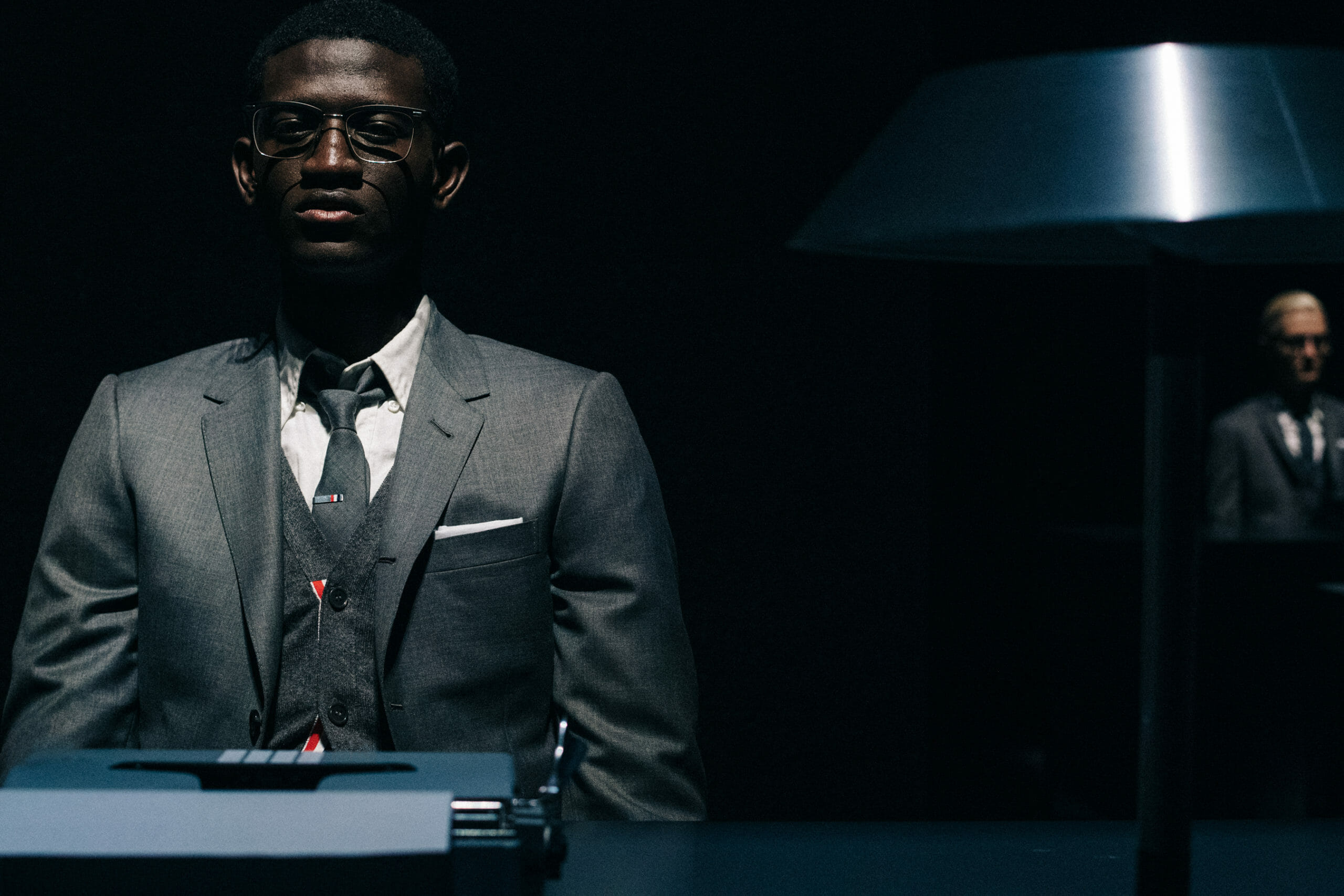 Models wearing Thom Browne suit