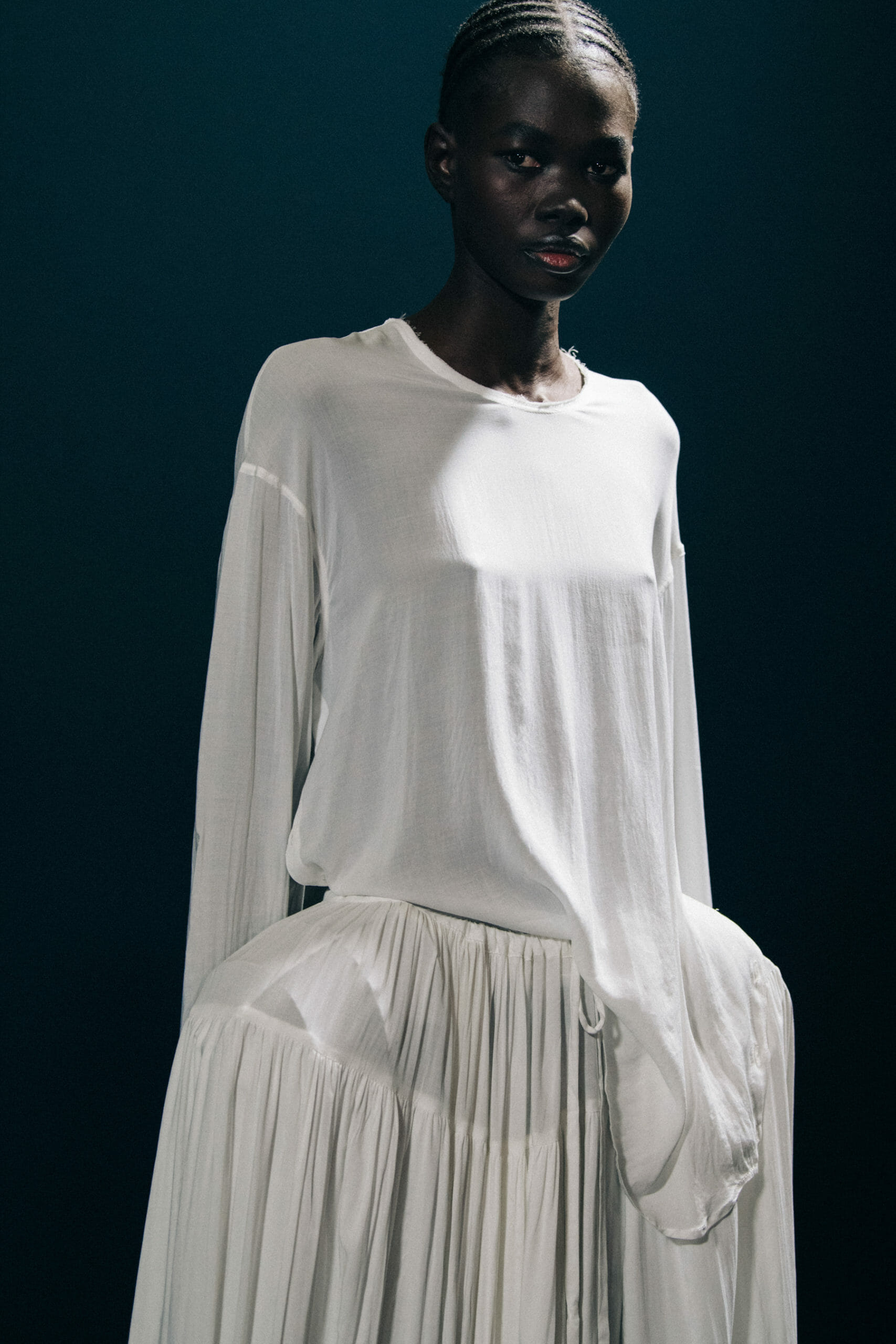 Model wearing white Ann Demeulemeester dress