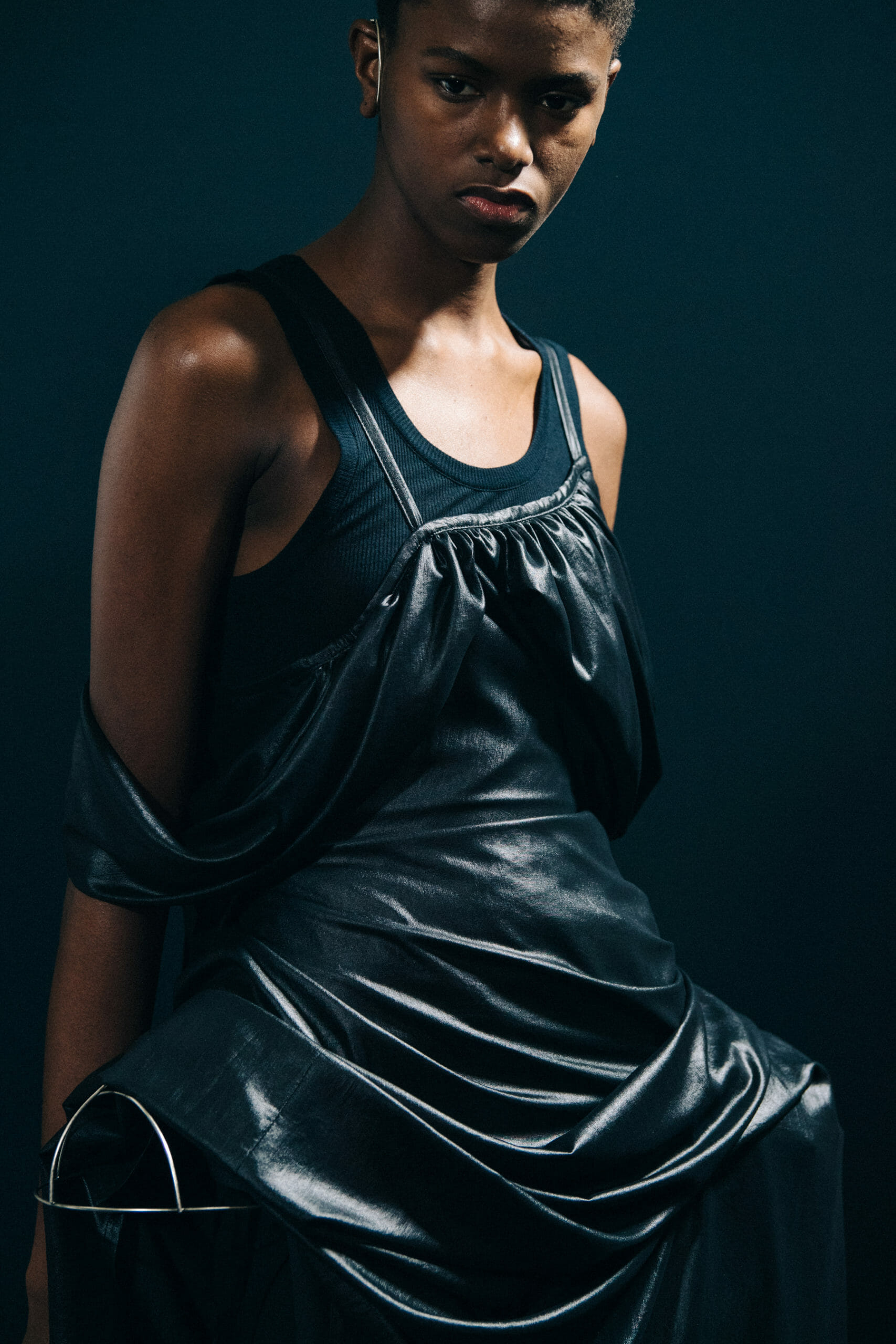 Model wearing black Ann Demeulemeester dress