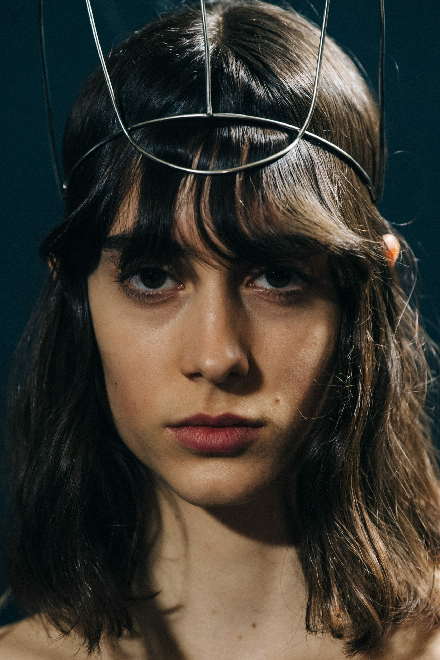 Models wearing metal headpieces at Ann Demeulemeester