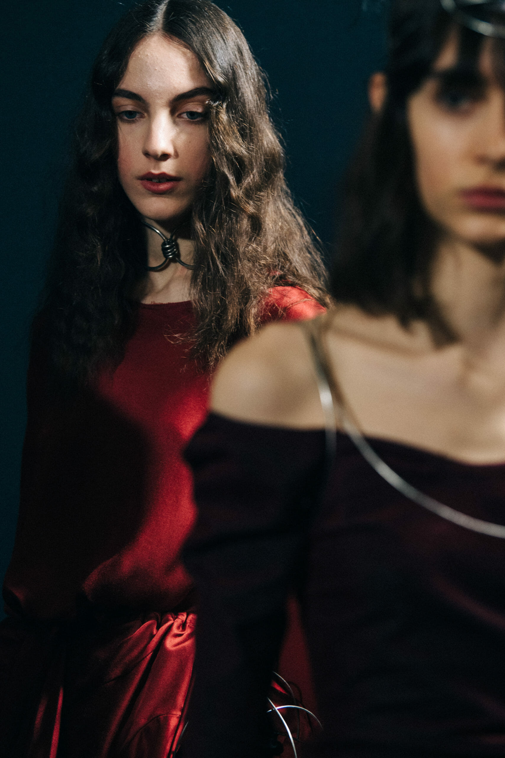 Model wearing red Ann Demeulemeester dress