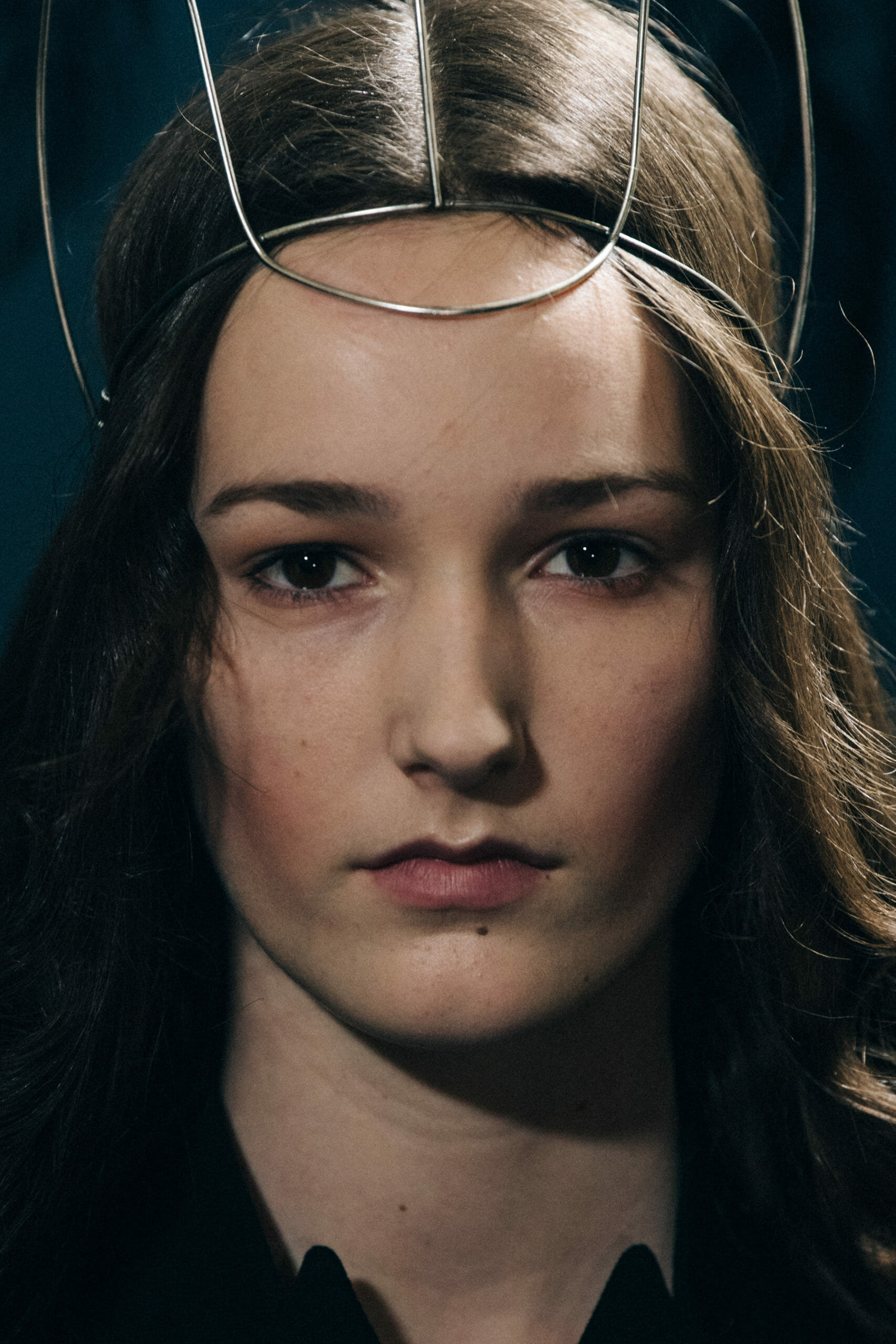 Models wearing metal headpieces at Ann Demeulemeester