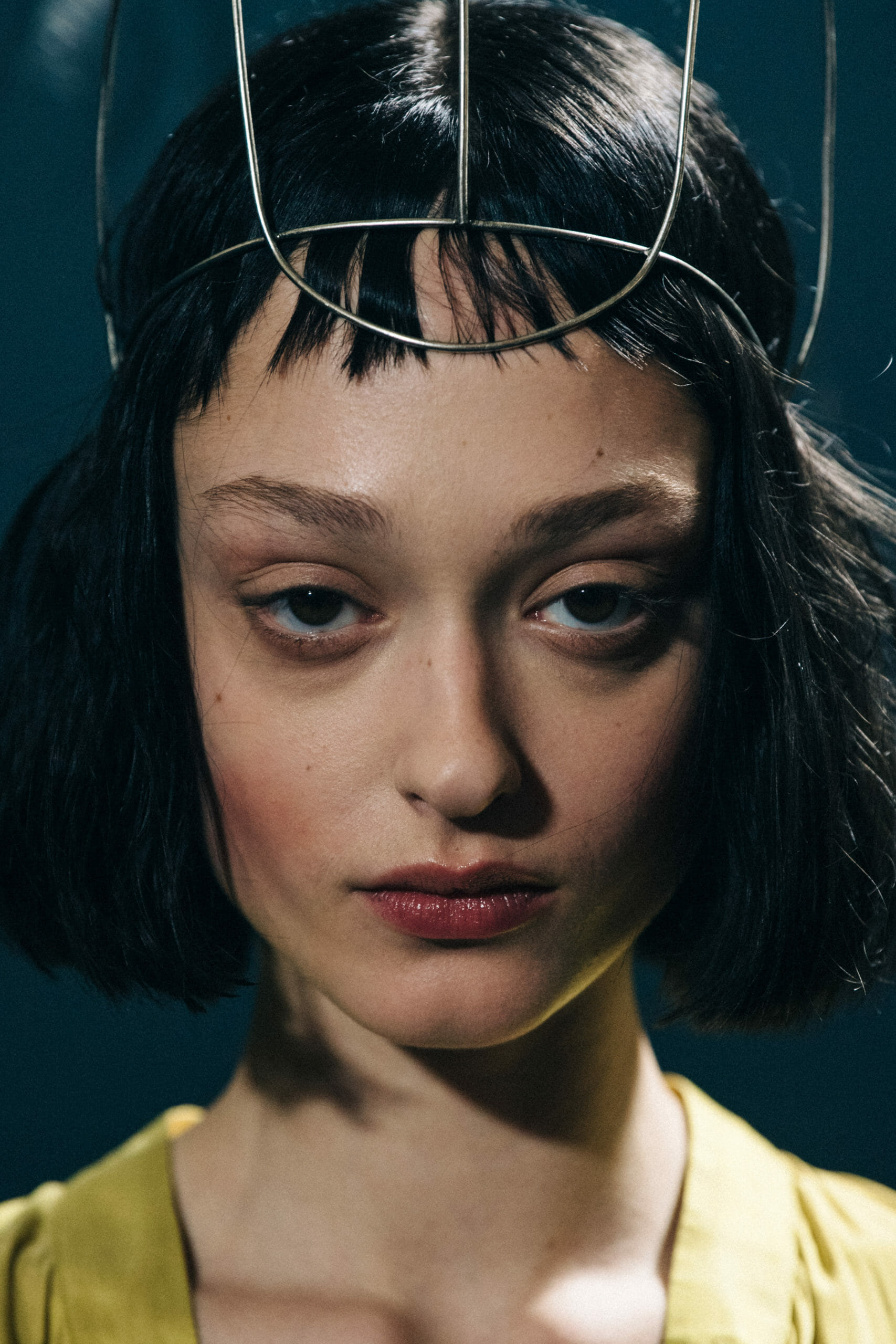 Models wearing metal headpieces at Ann Demeulemeester