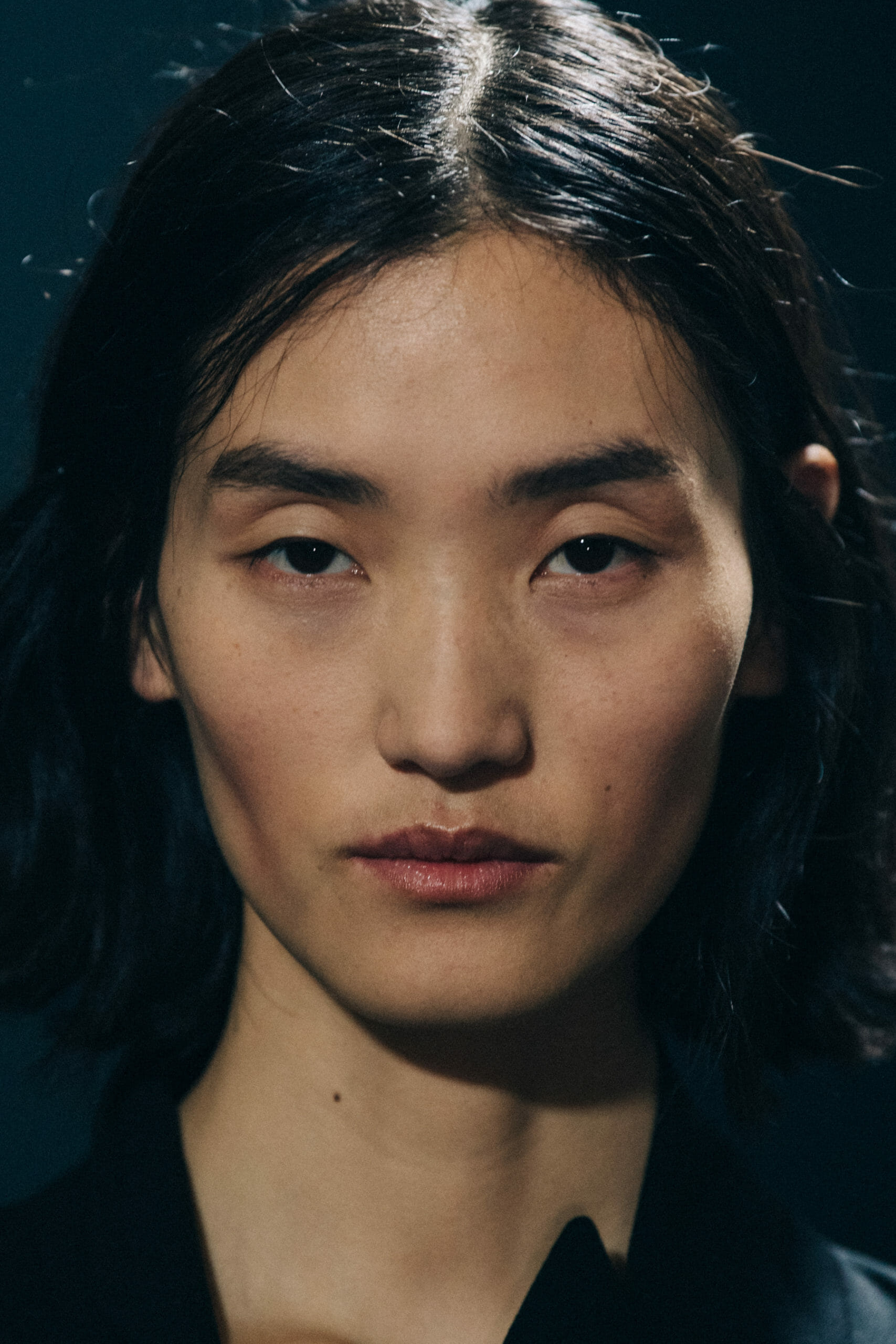 Model with messy dark hair
