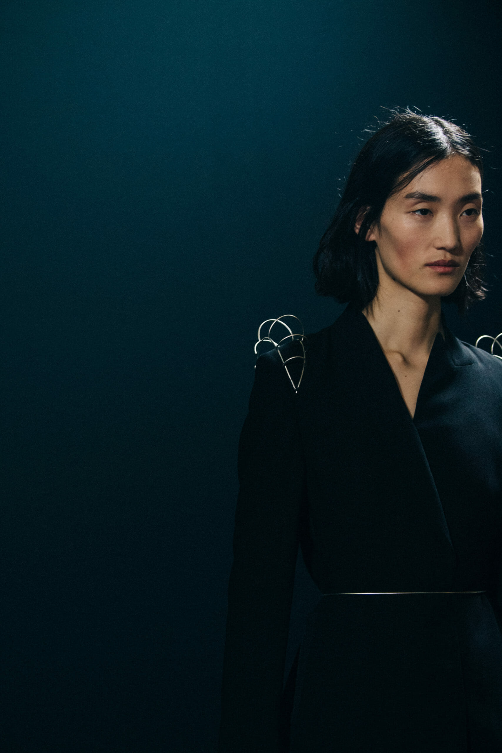 Model wearing black Ann Demeulemeester dress