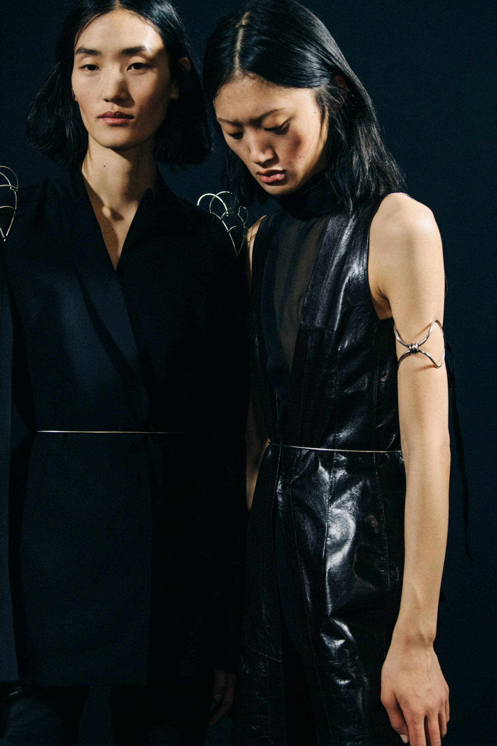 Model wearing black Ann Demeulemeester dress