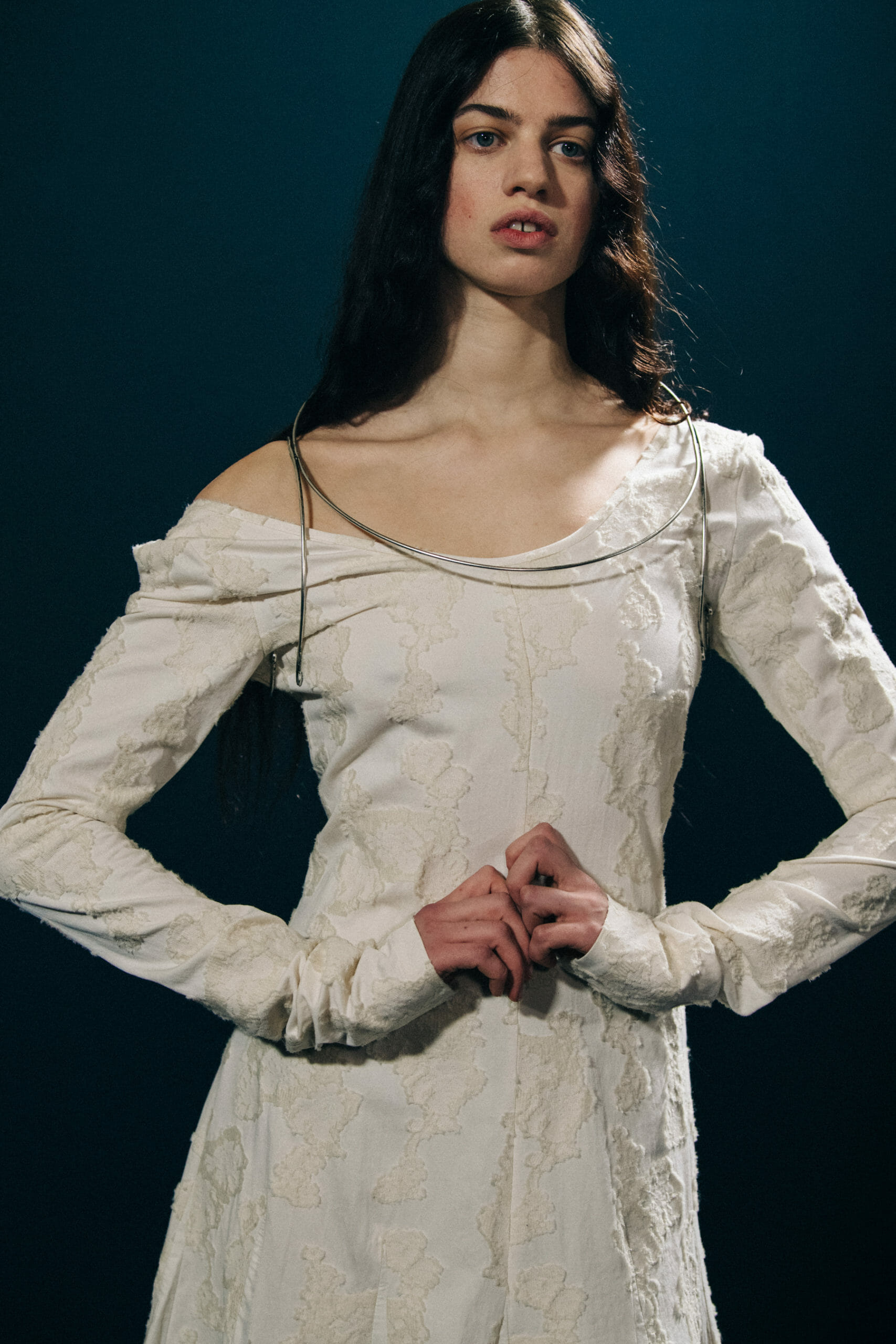 Model wearing white Ann Demeulemeester dress