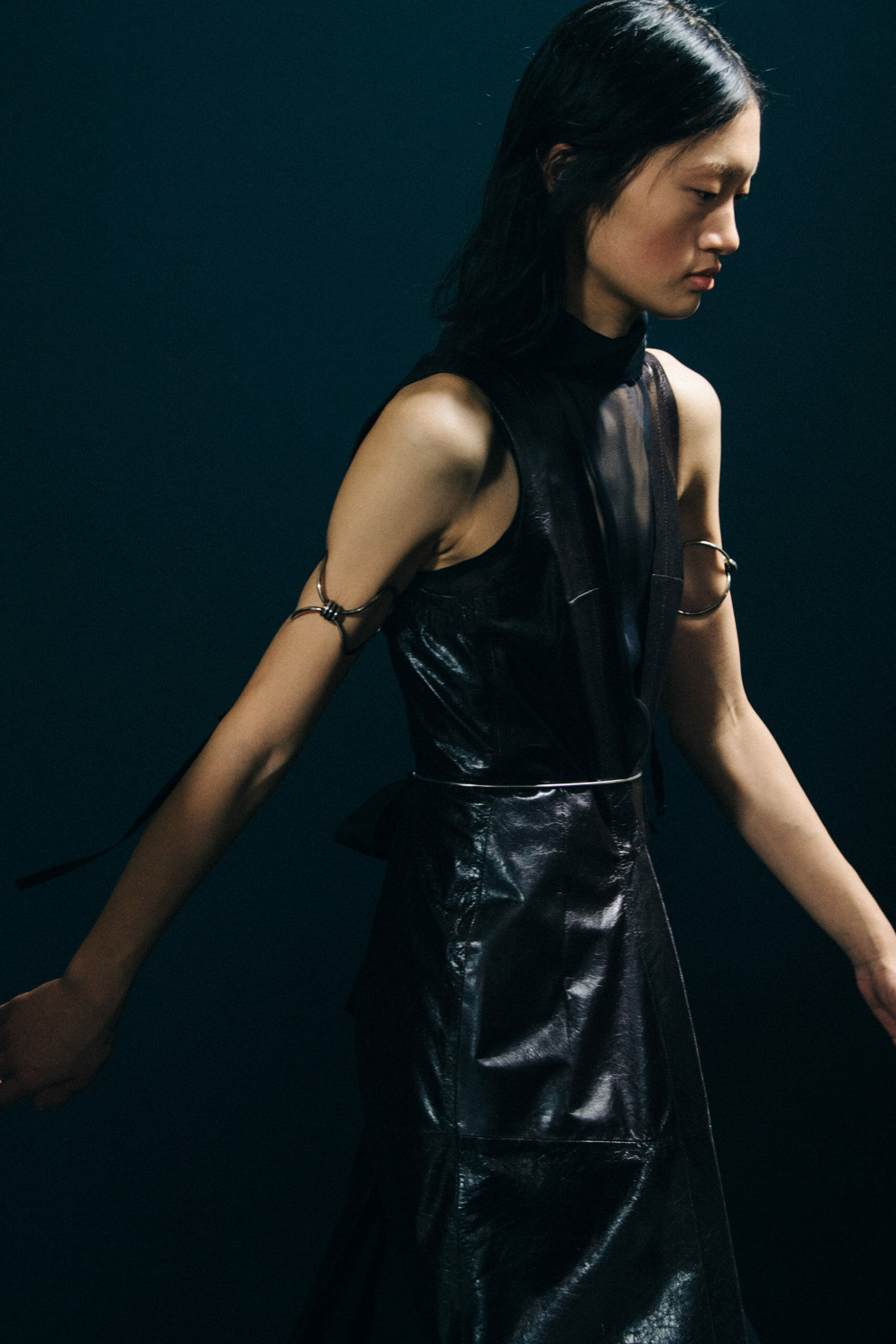 Model wearing black Ann Demeulemeester dress
