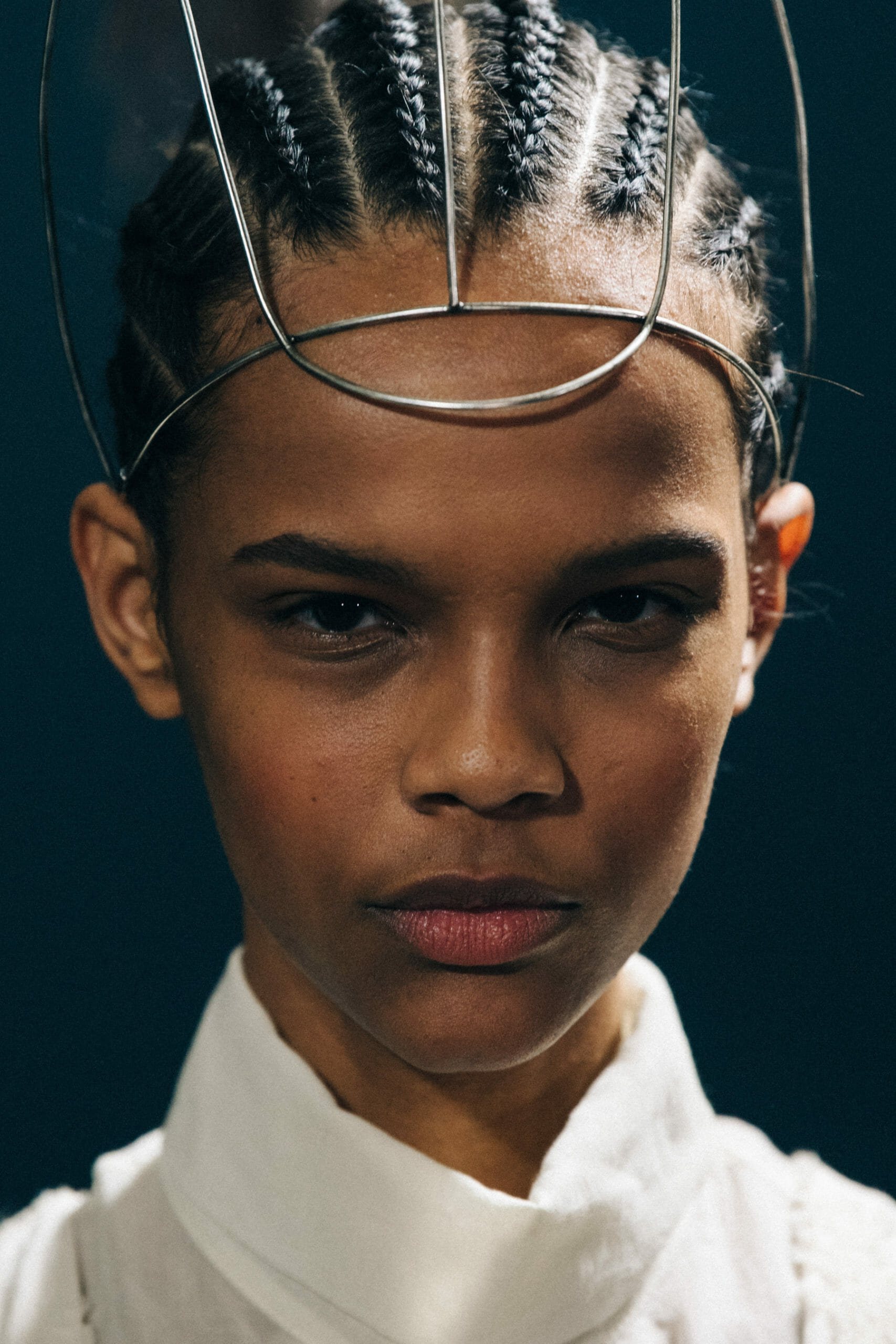 Models wearing metal headpieces at Ann Demeulemeester