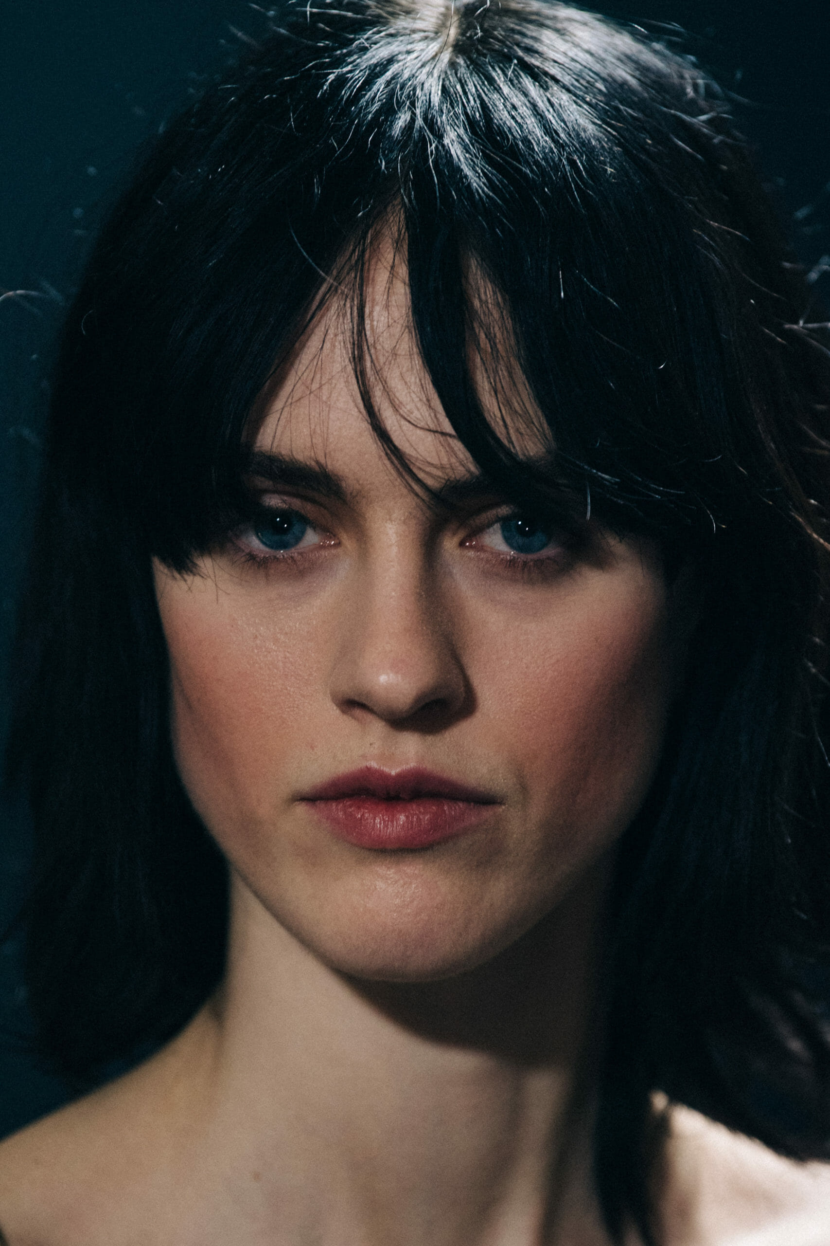 Model with messy dark hair