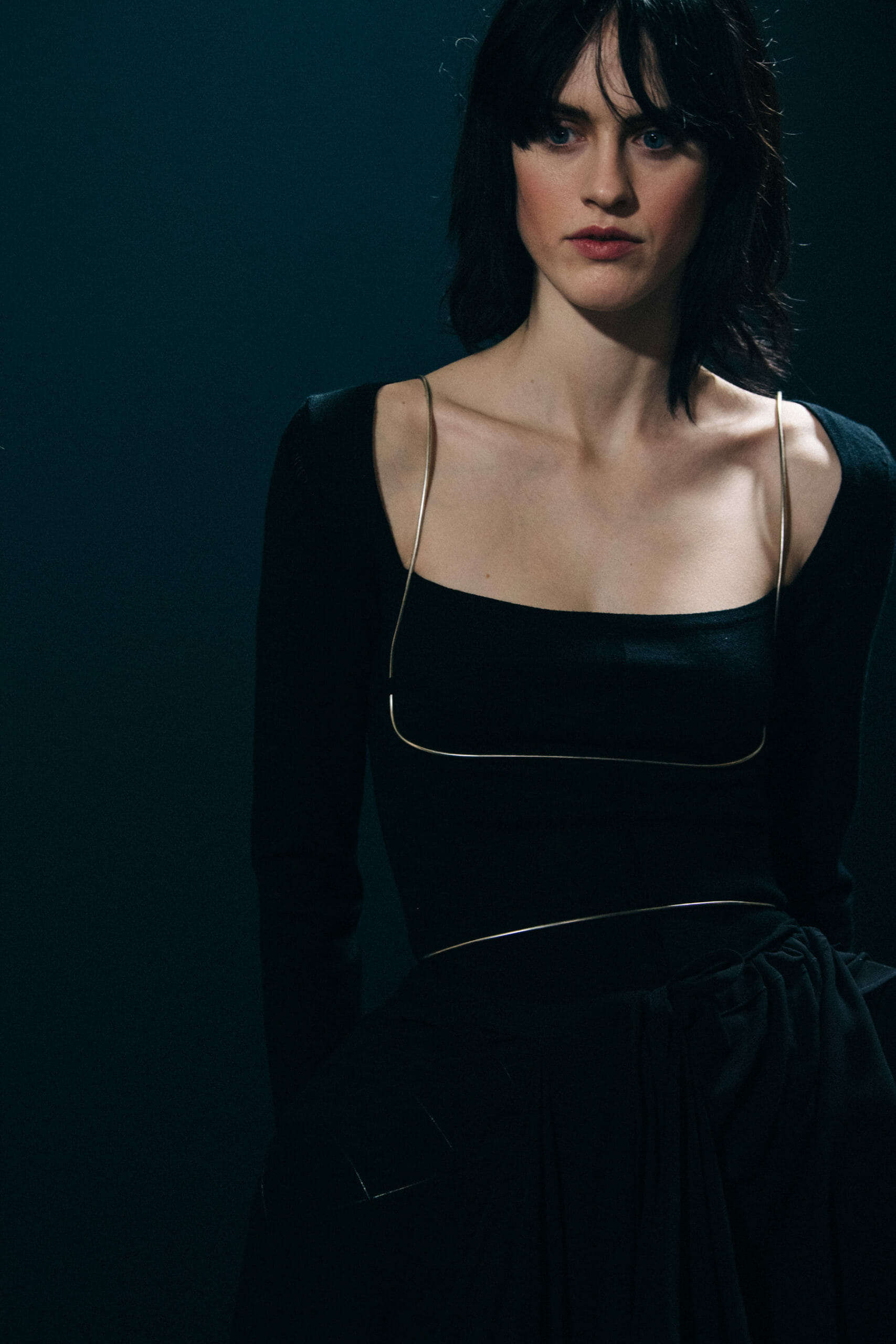 Model wearing black Ann Demeulemeester dress