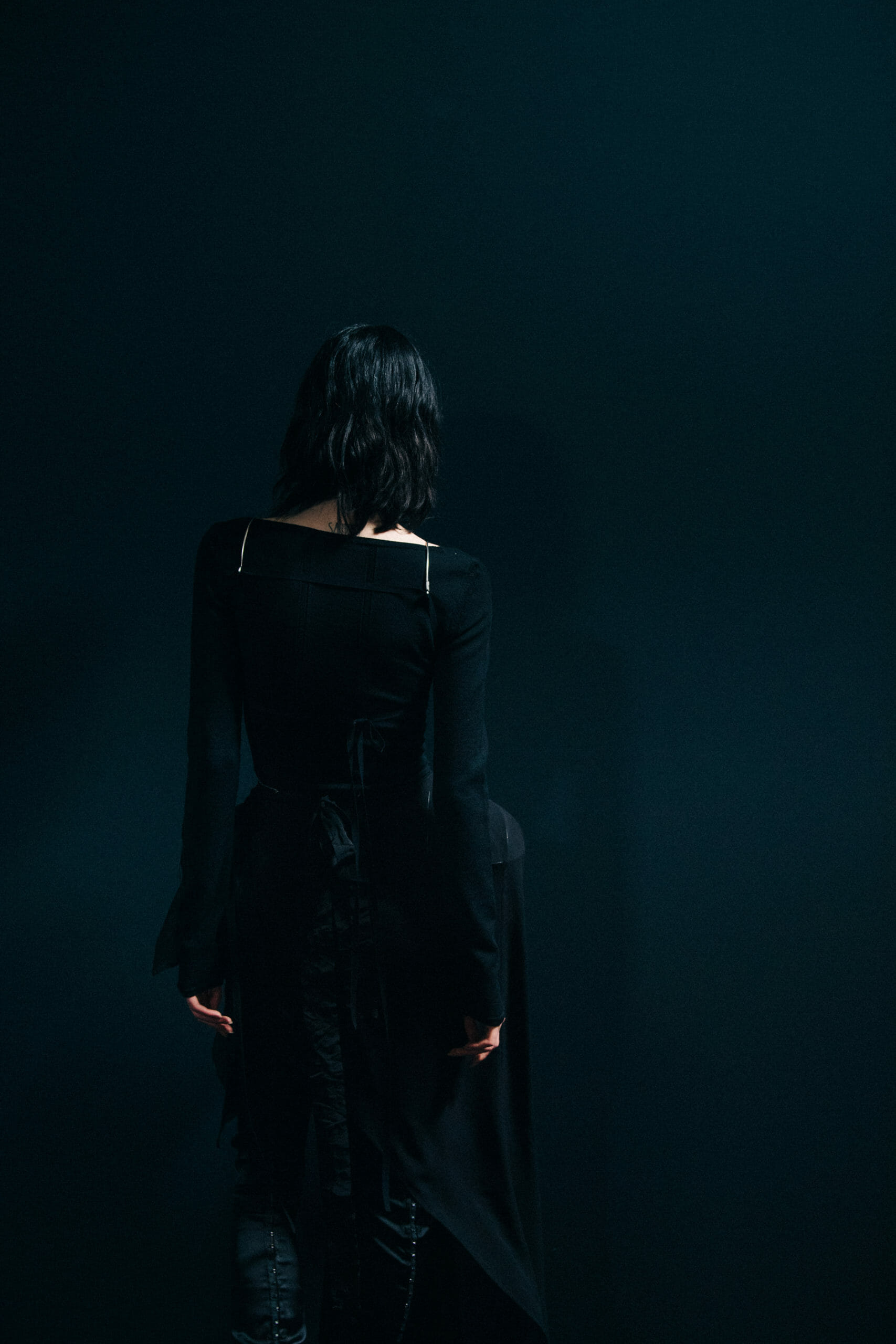 Model wearing black Ann Demeulemeester dress