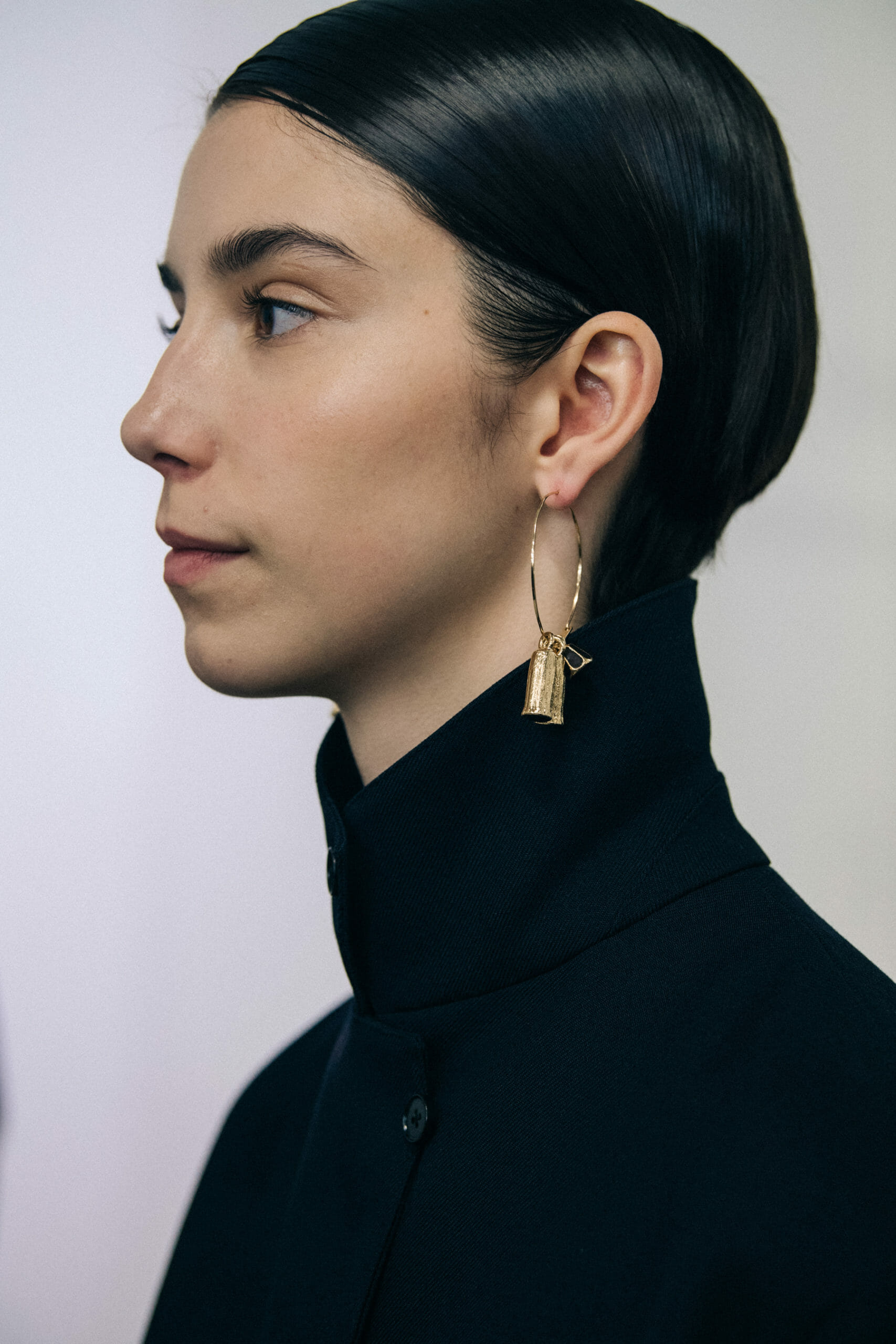 Model wearing black Jil Sander outfit