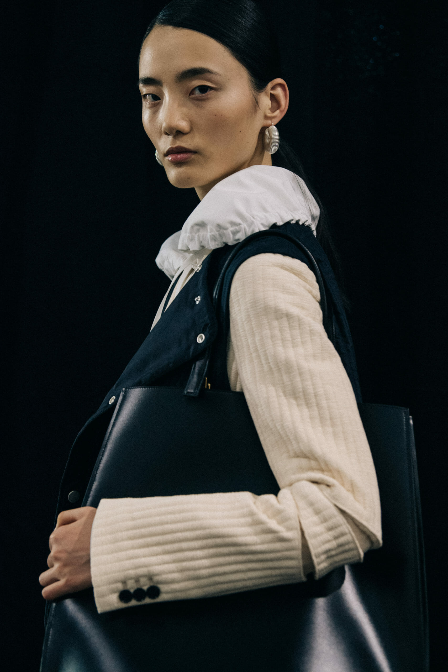 Model wearing wool Jil Sander outfit