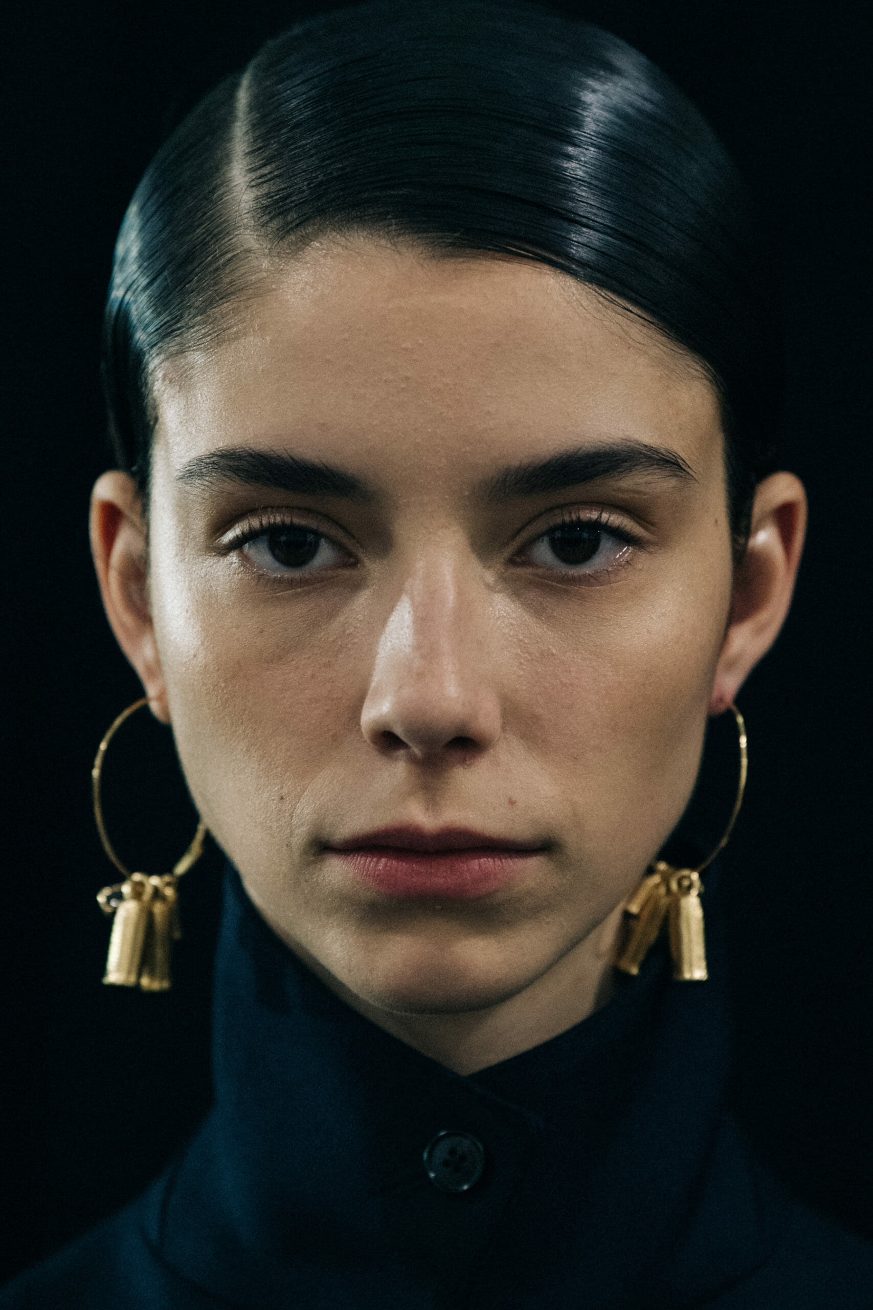 Model wearing black Jil Sander outfit
