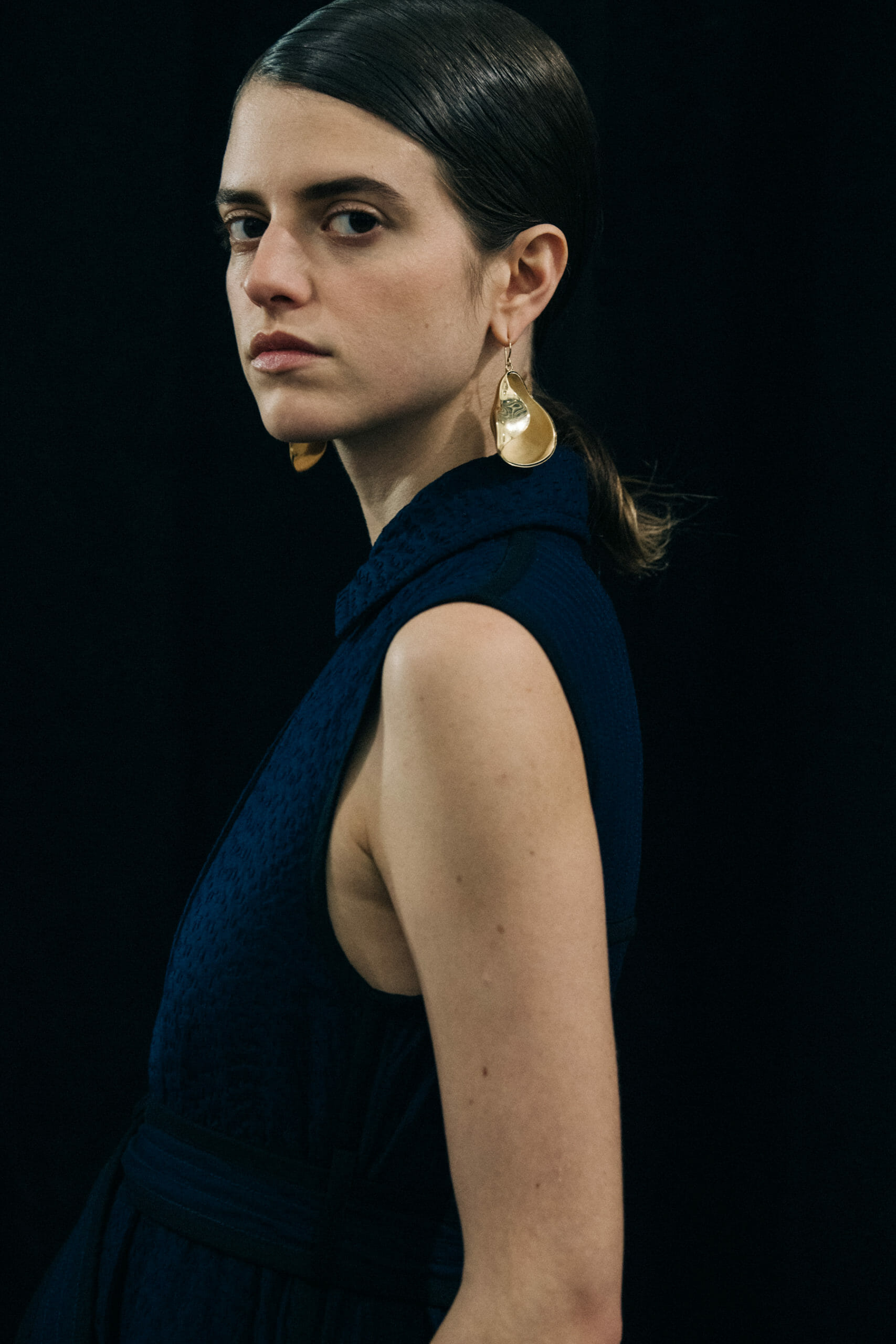 Model wearing black Jil Sander outfit