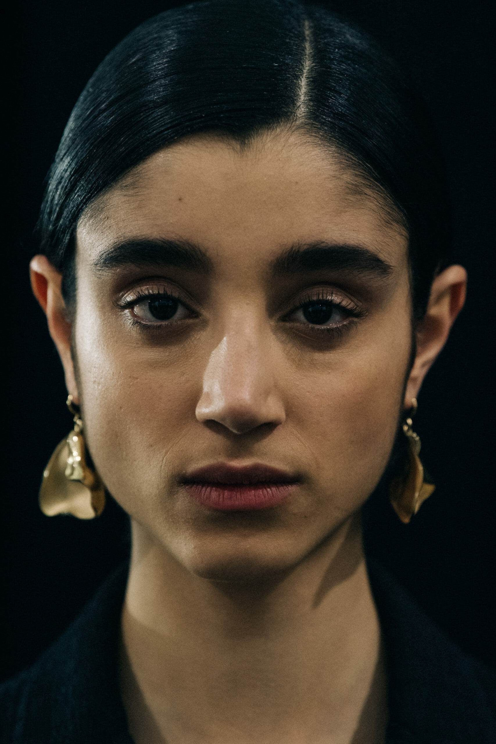 Model wearing black Jil Sander outfit