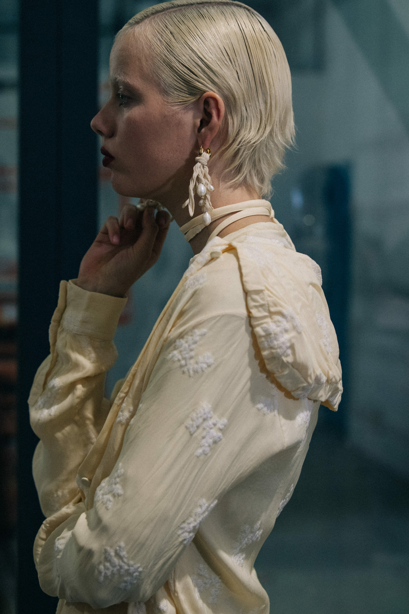 Model wearing light Jil Sander outfit