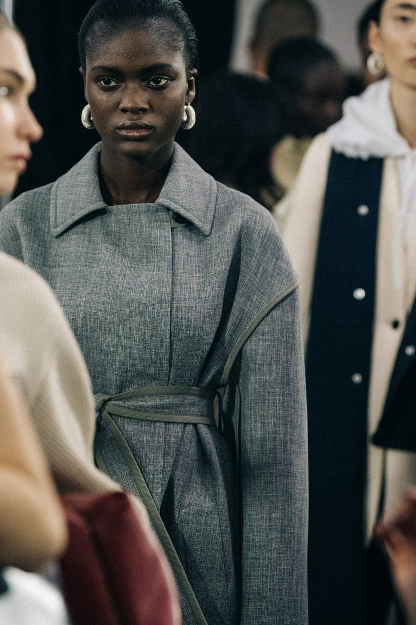Model wearing Jil Sander earrings