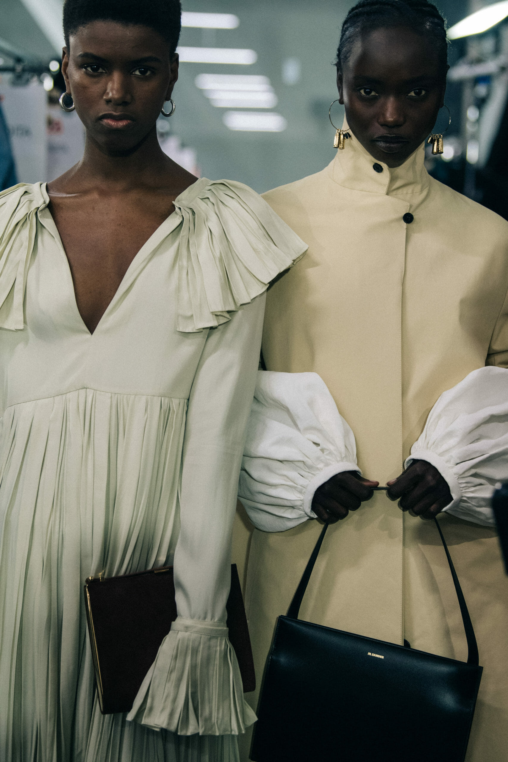 Model wearing light Jil Sander outfit