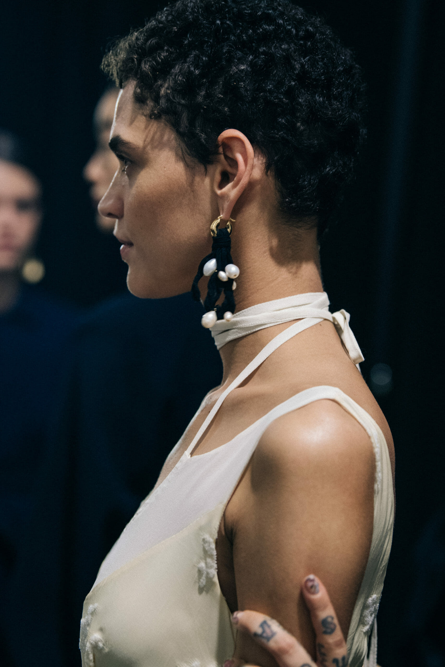 Model wearing light Jil Sander outfit