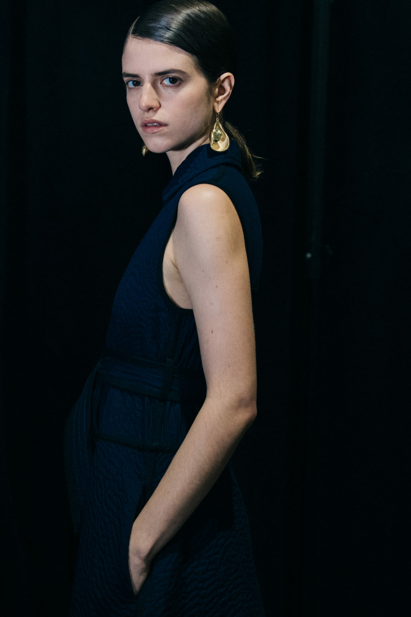 Model wearing black Jil Sander outfit