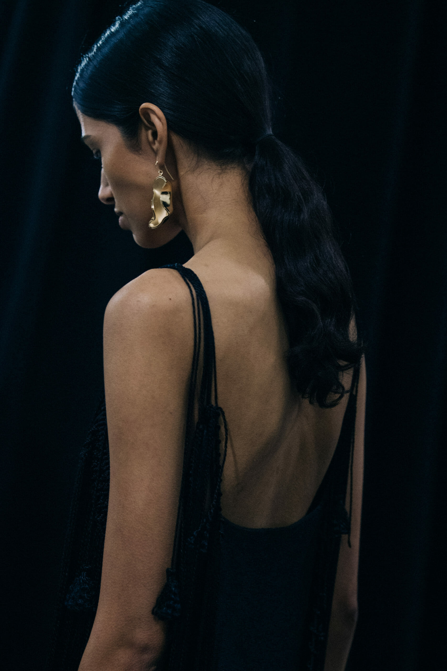 Model wearing black Jil Sander outfit