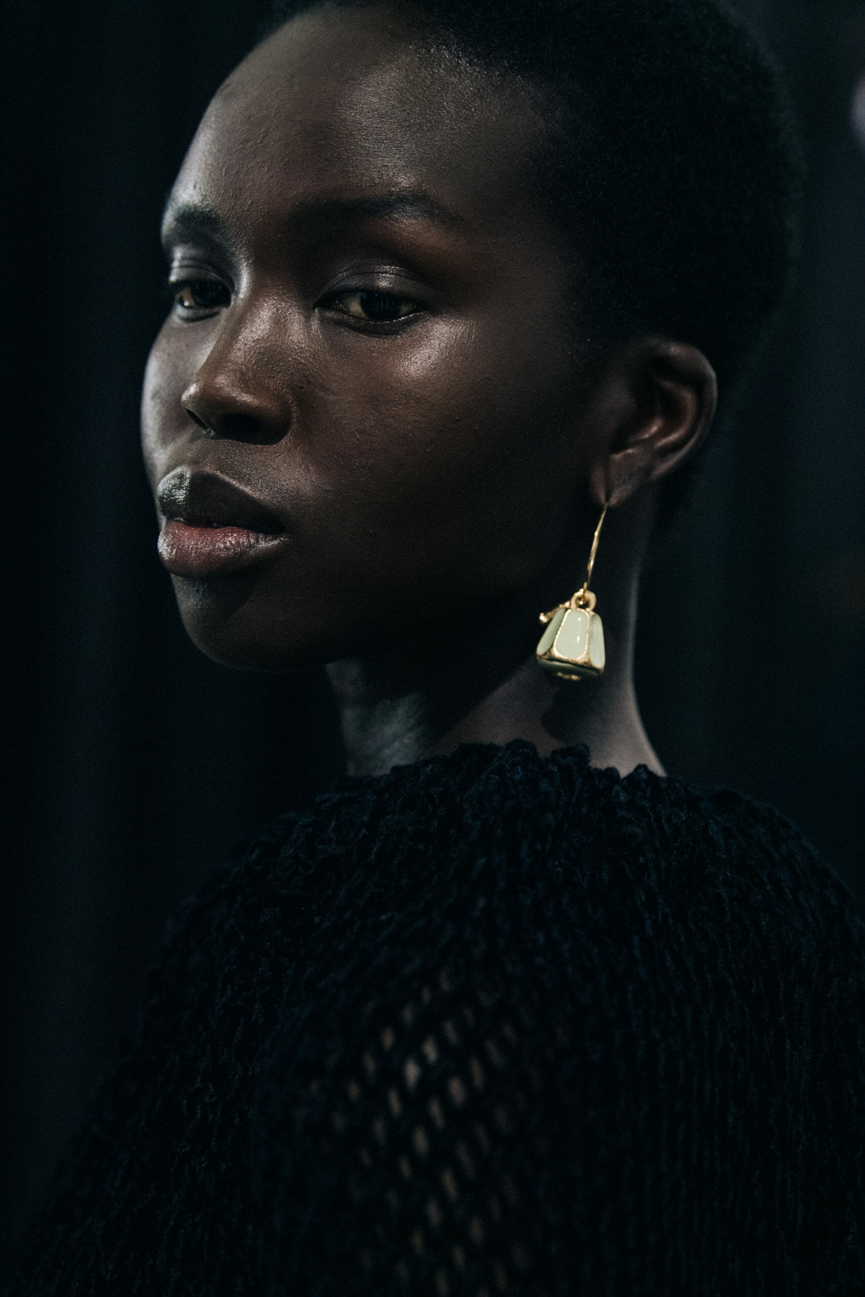 Model wearing black Jil Sander outfit