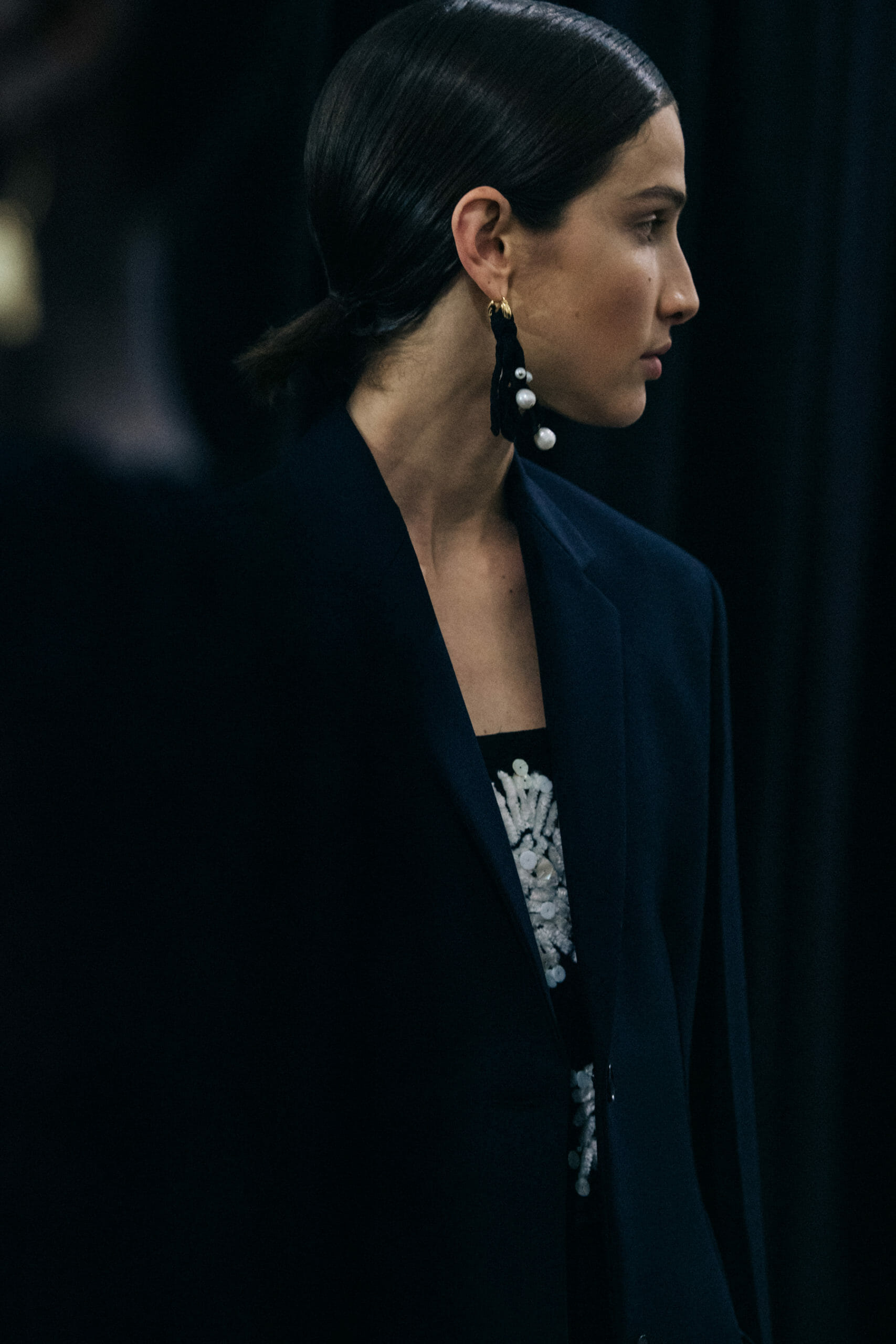 Model wearing black Jil Sander outfit