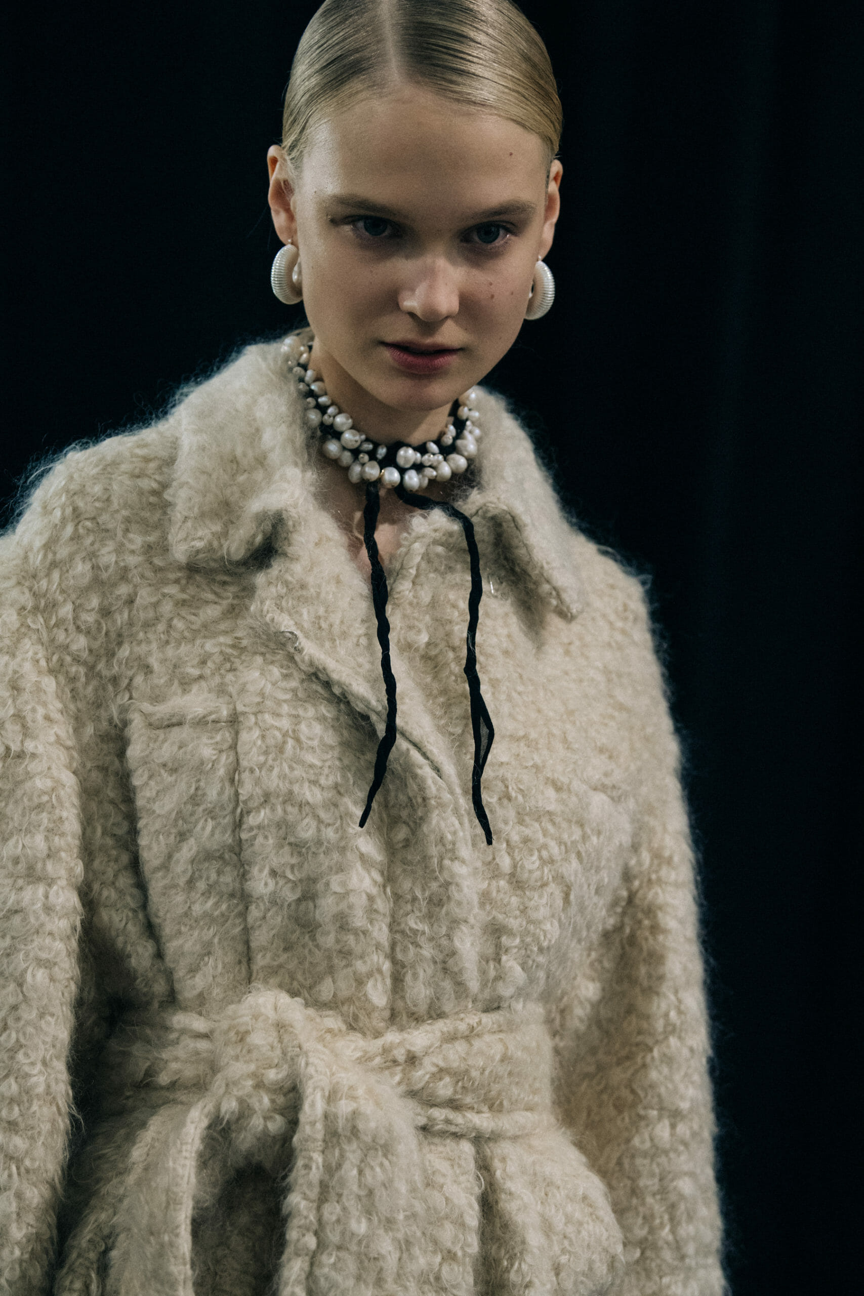 Model wearing wool Jil Sander outfit