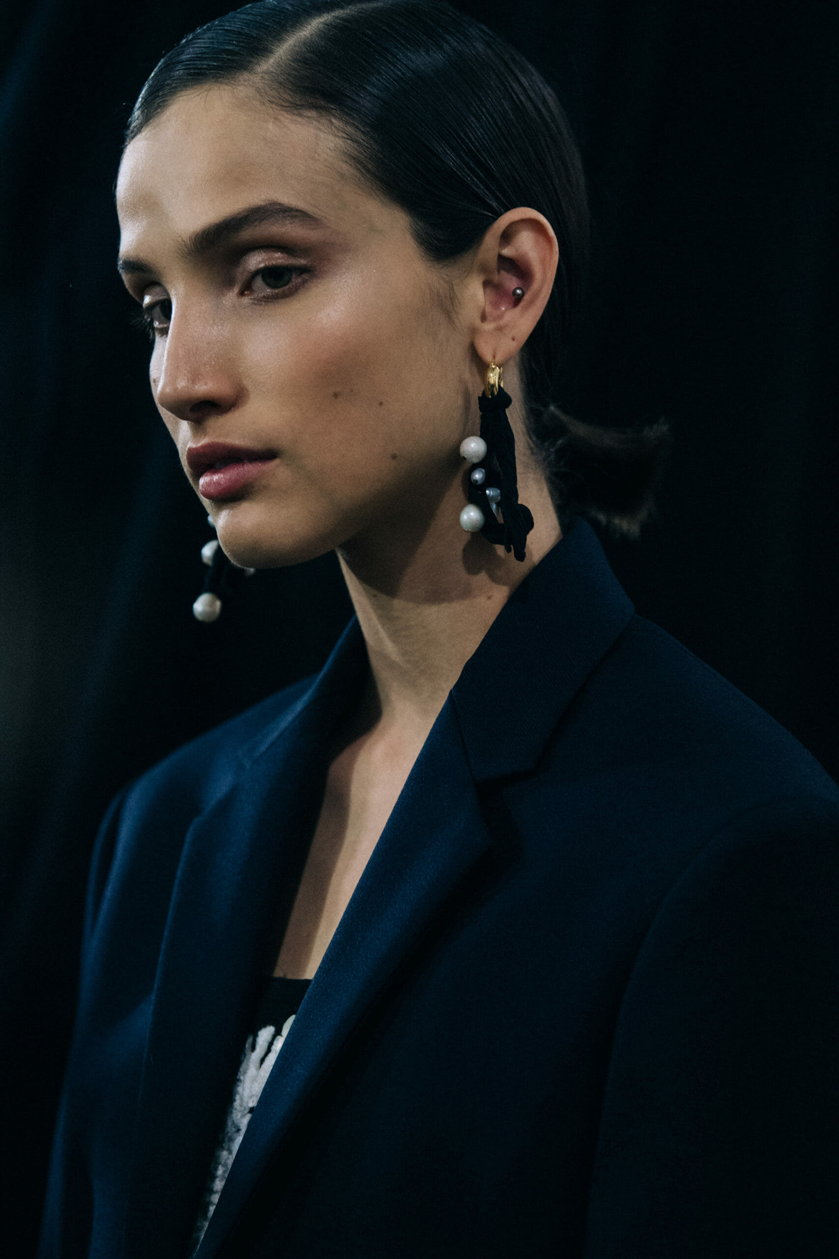 Model wearing black Jil Sander outfit