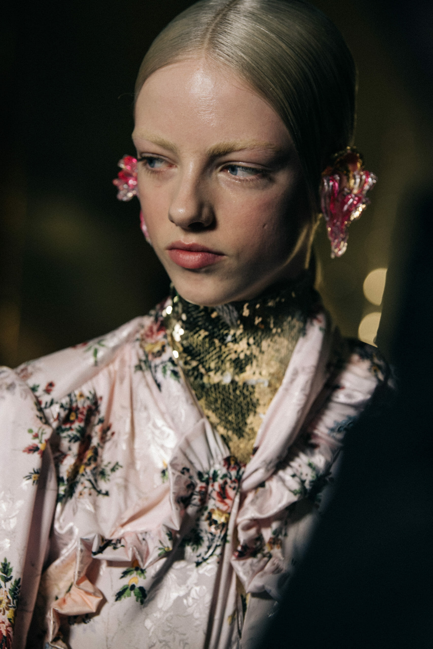 Model wearing interesting earring