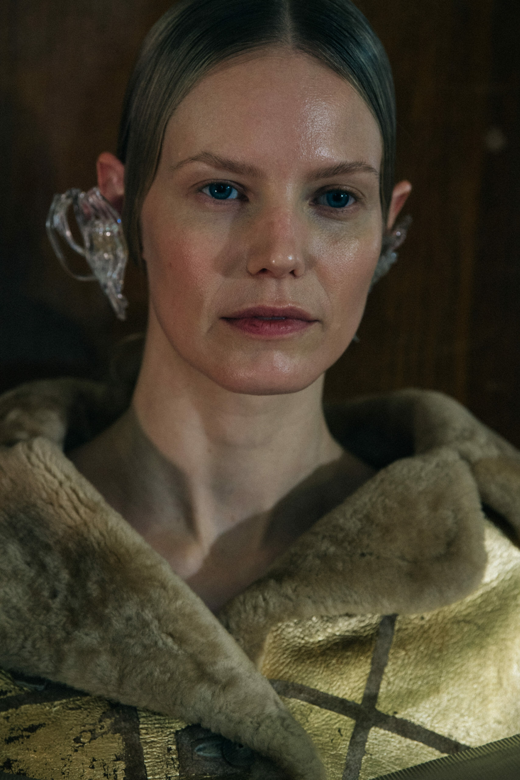 Model wearing interesting earring