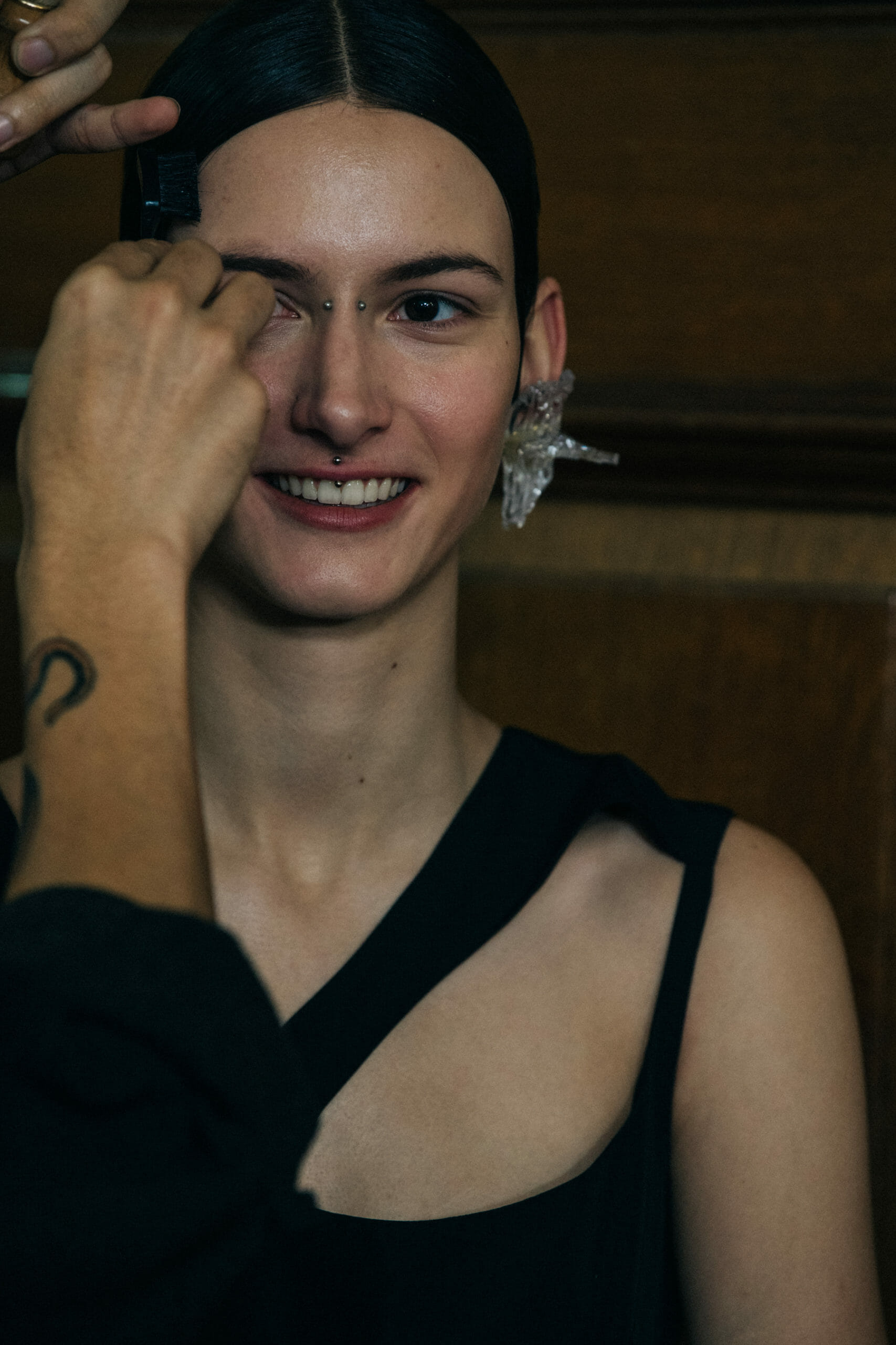 Model wearing interesting earring