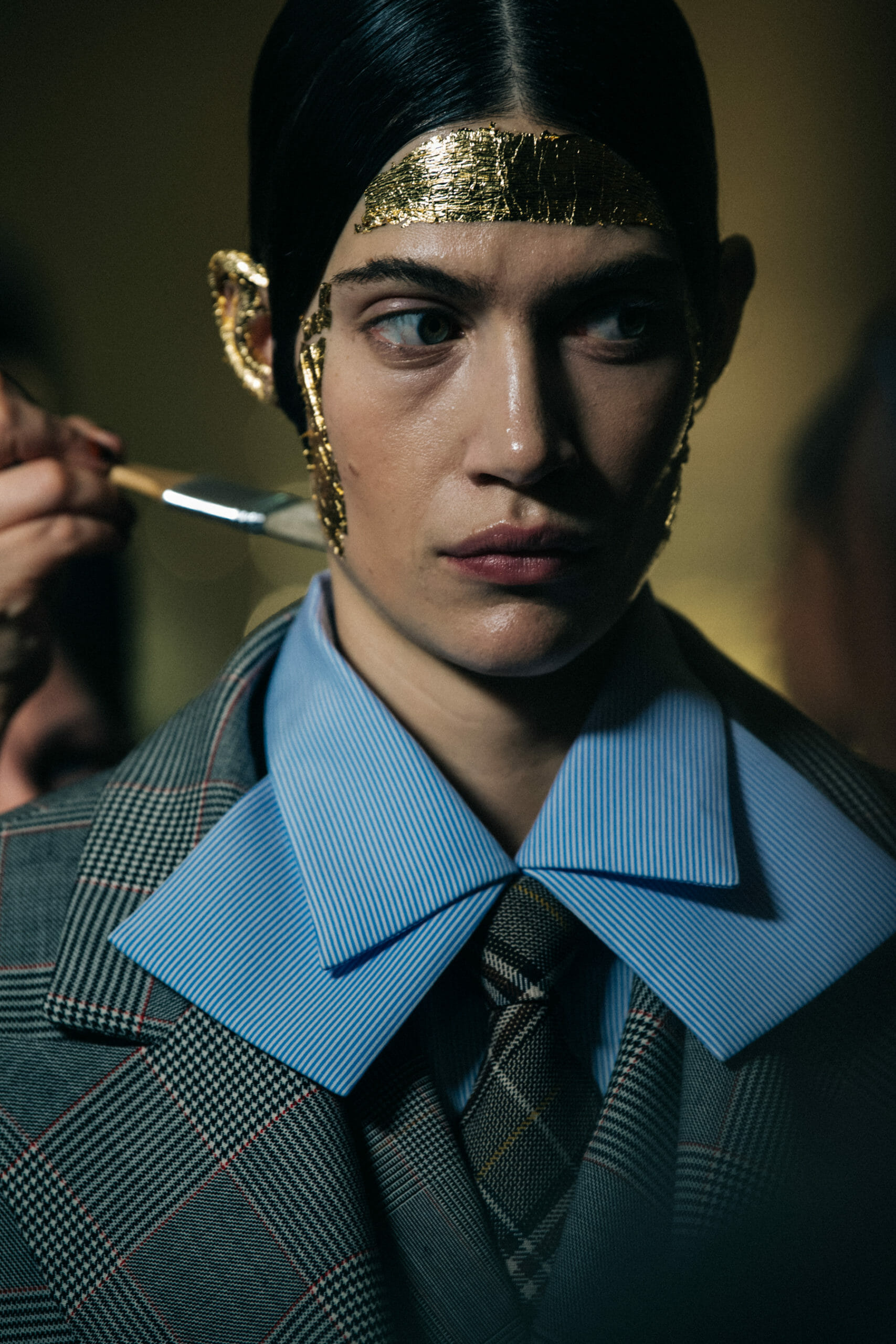 Model wearing blue collar shirt