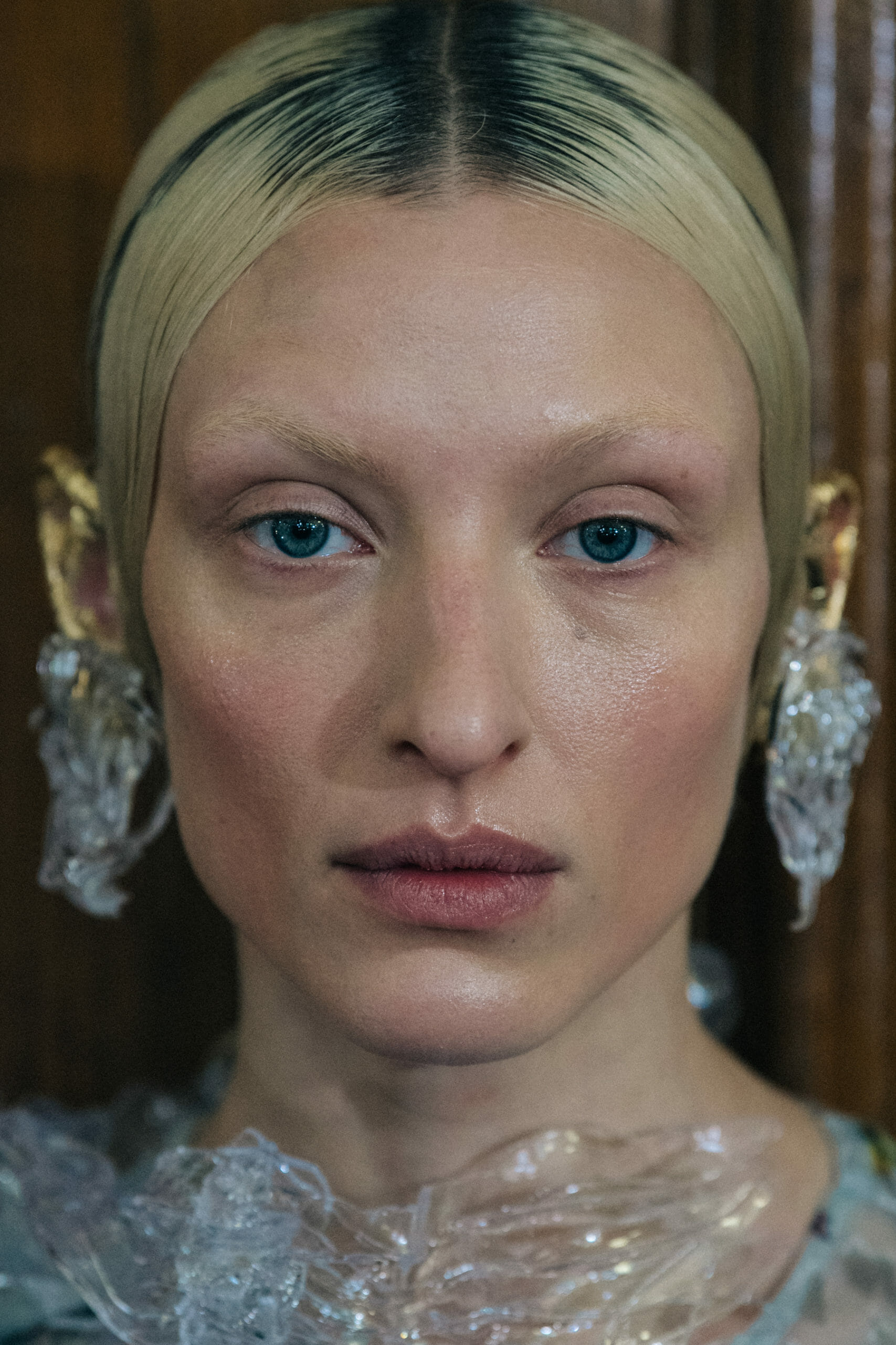 Model wearing interesting earring