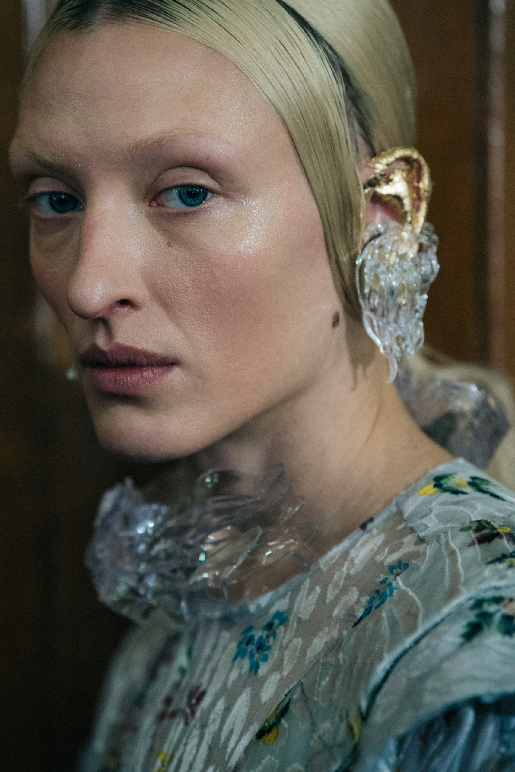 Model wearing interesting earring