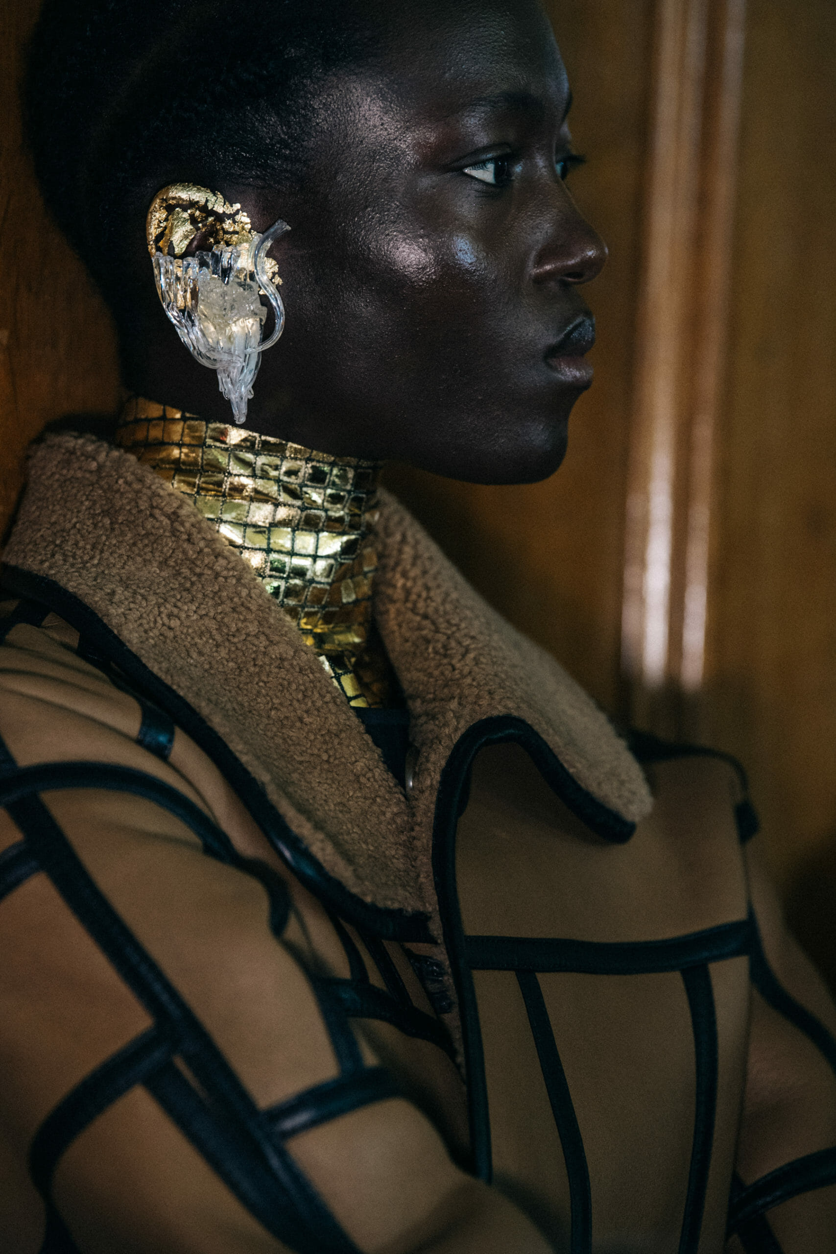 Model wearing interesting earring