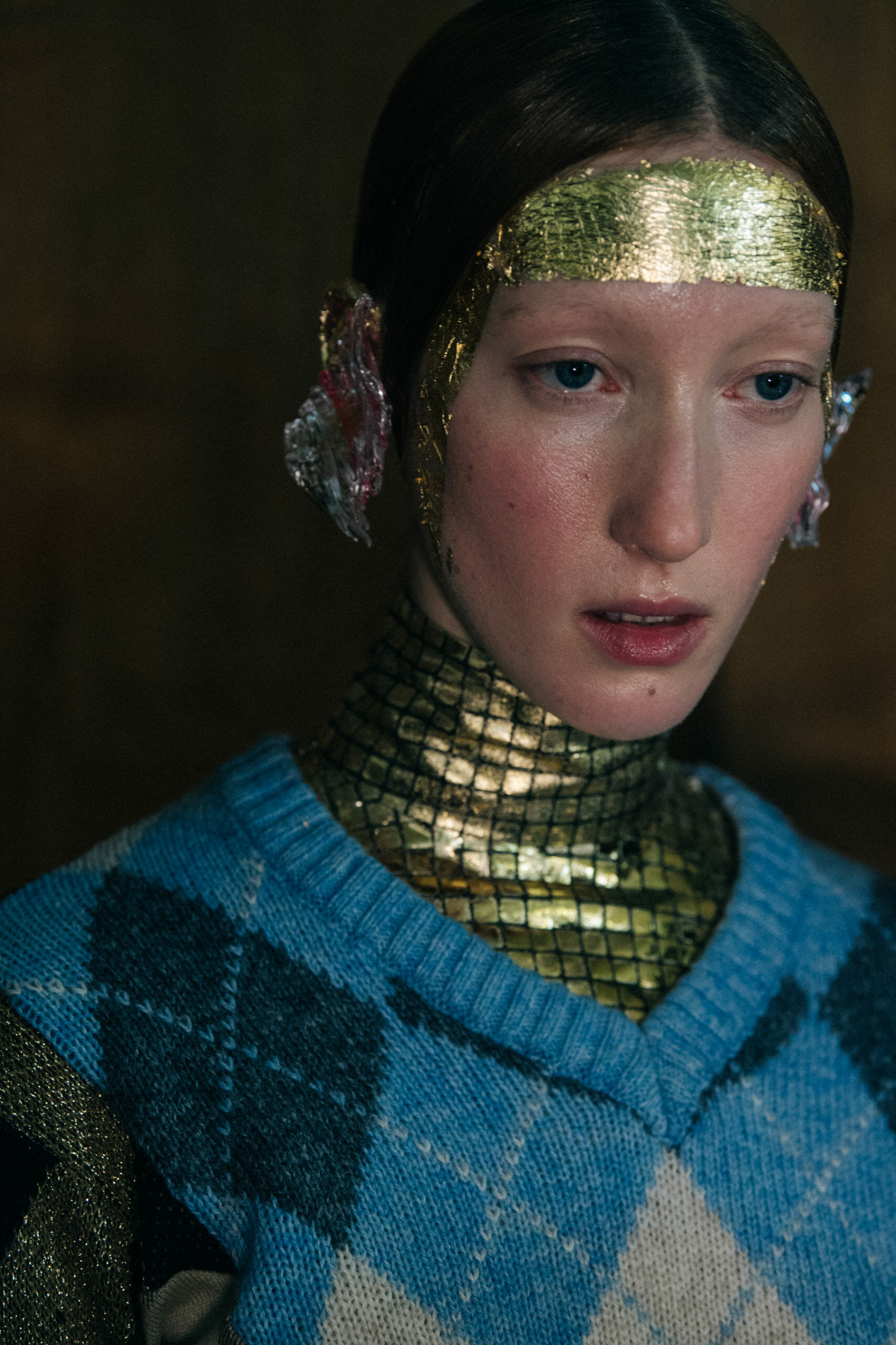 Model wearing interesting earring