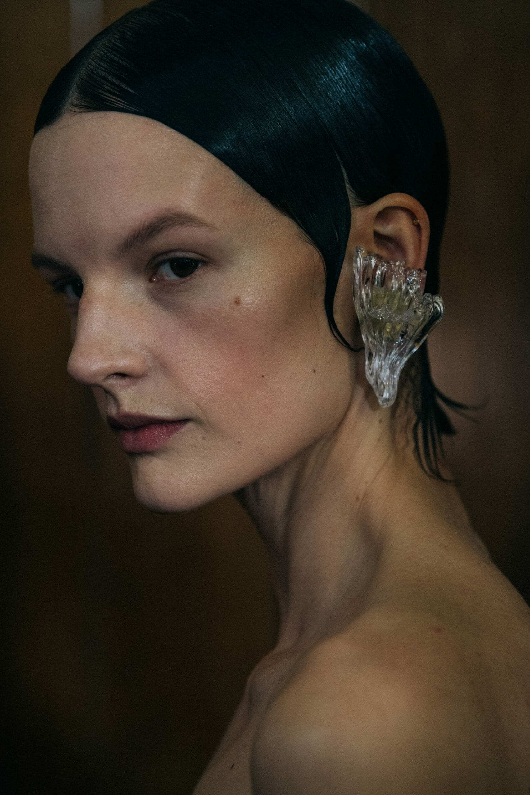 Model wearing interesting earring