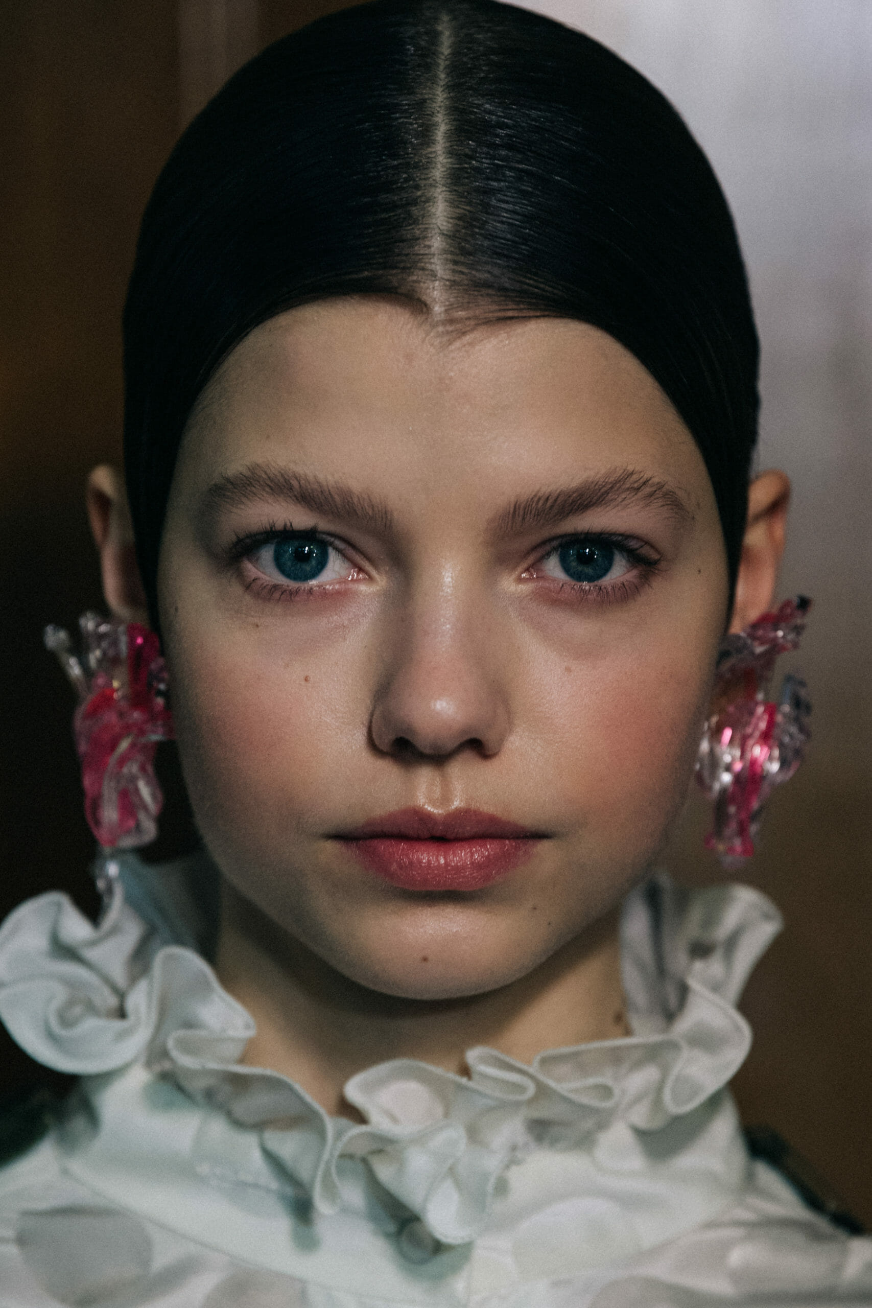 Model wearing interesting earring