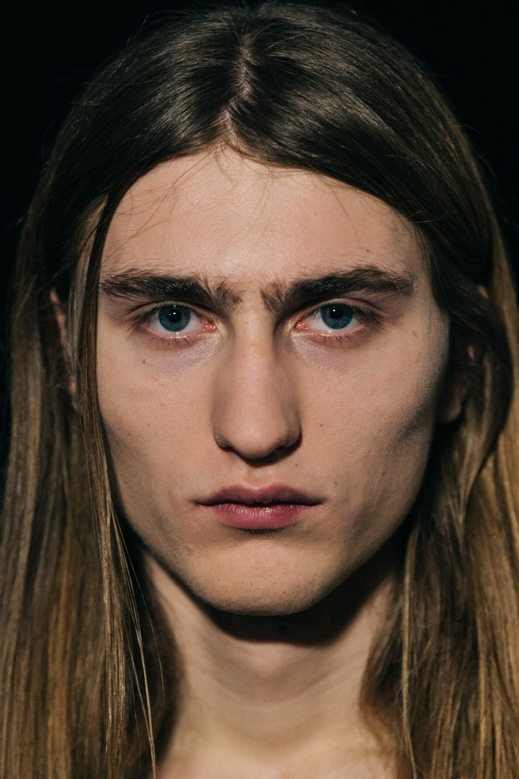 Model with long hair backstage