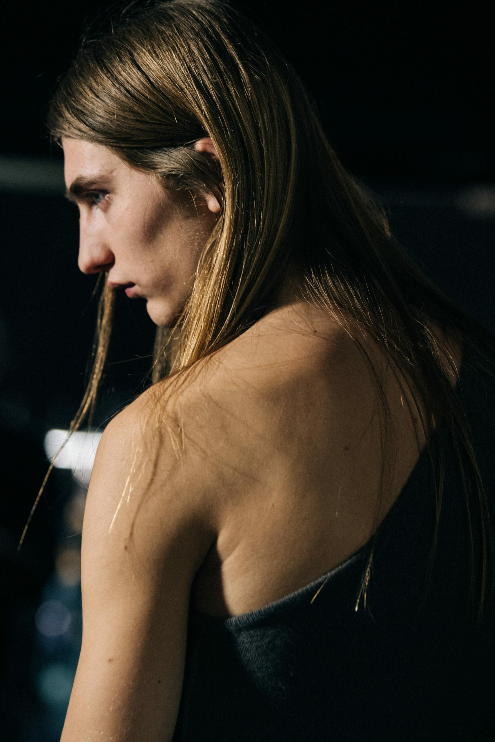 Model with long hair backstage