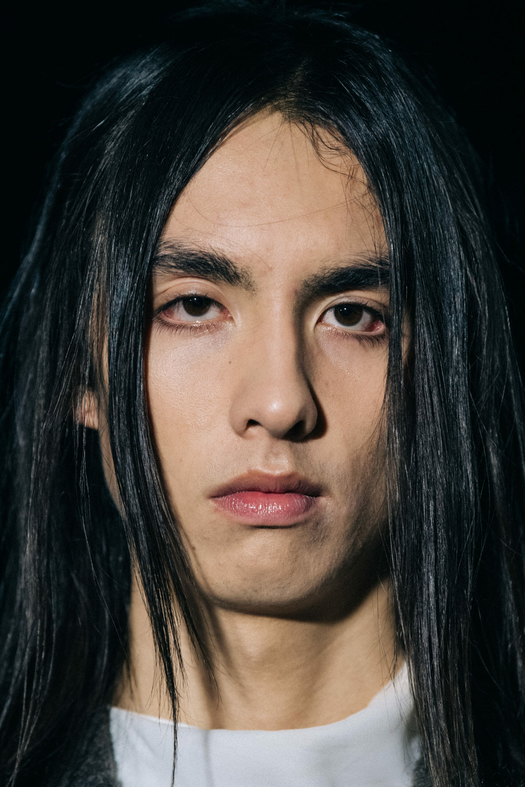 Model with long hair backstage