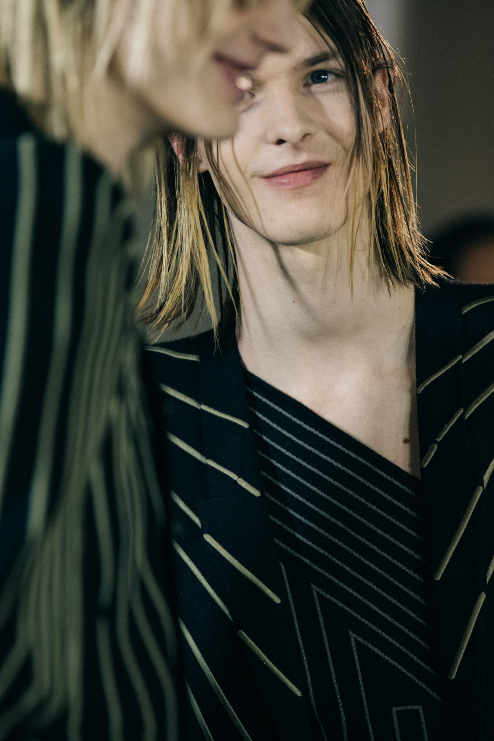 Model wearing striped Rick Owens suit