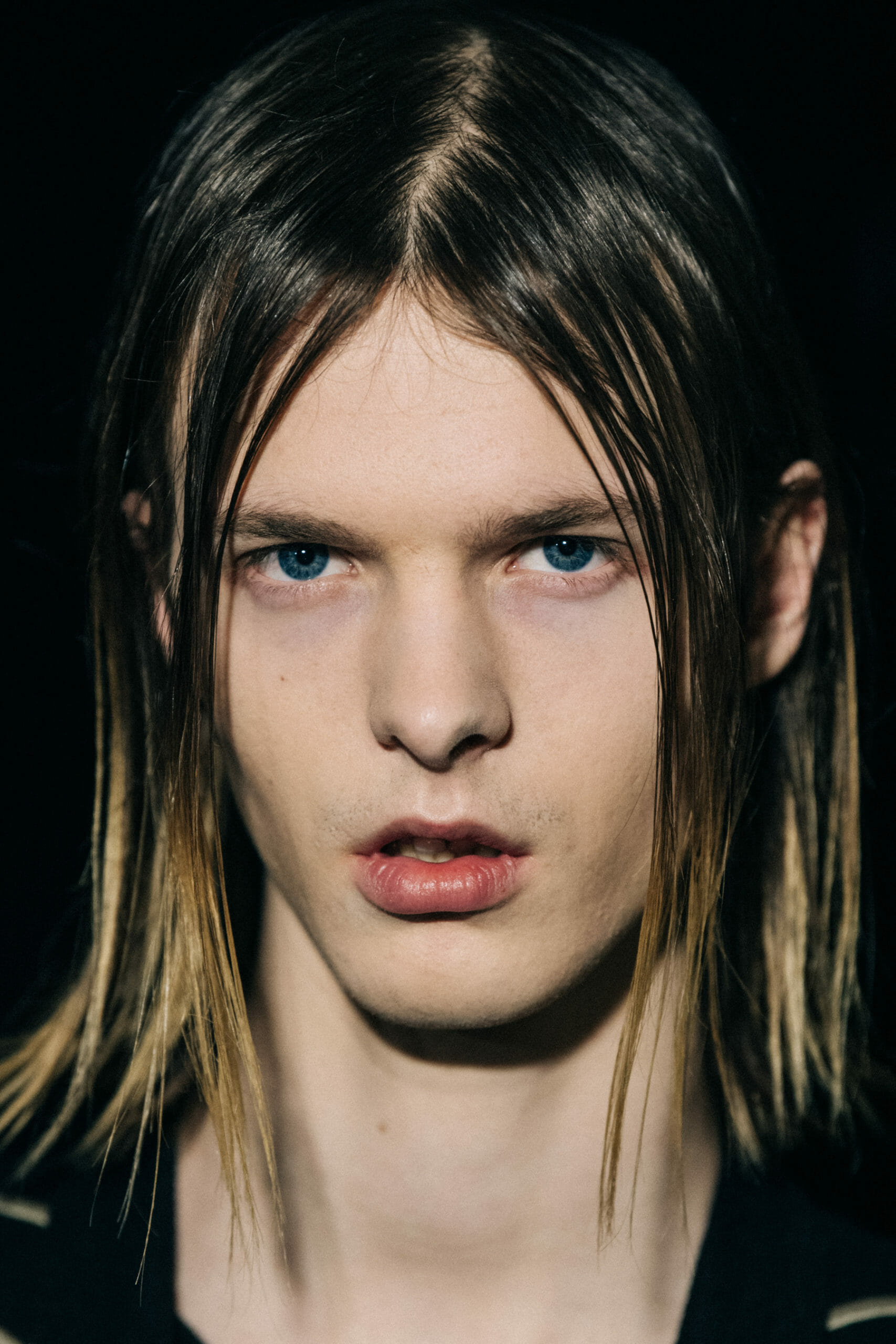 Model with long hair backstage