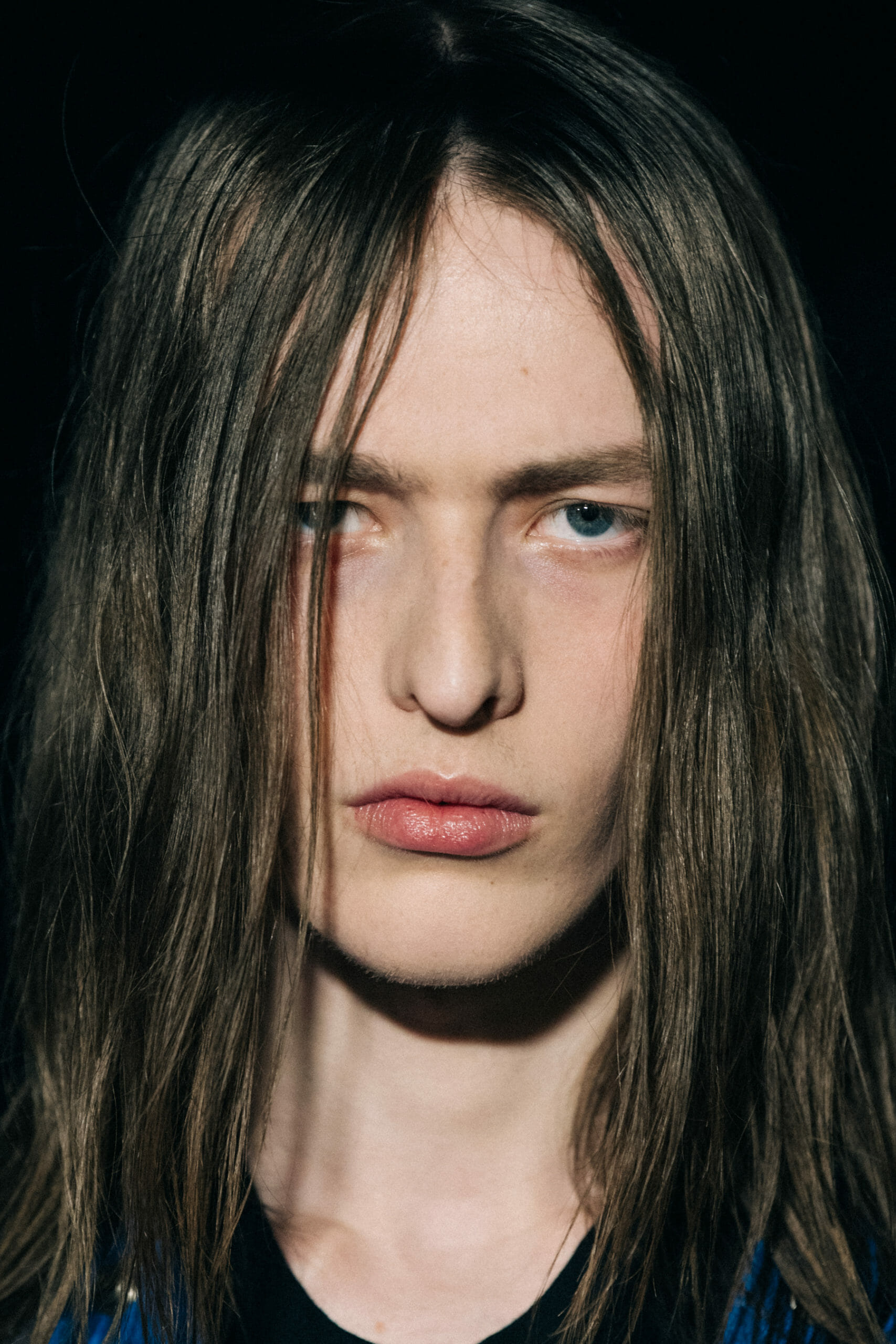 Model with long hair backstage
