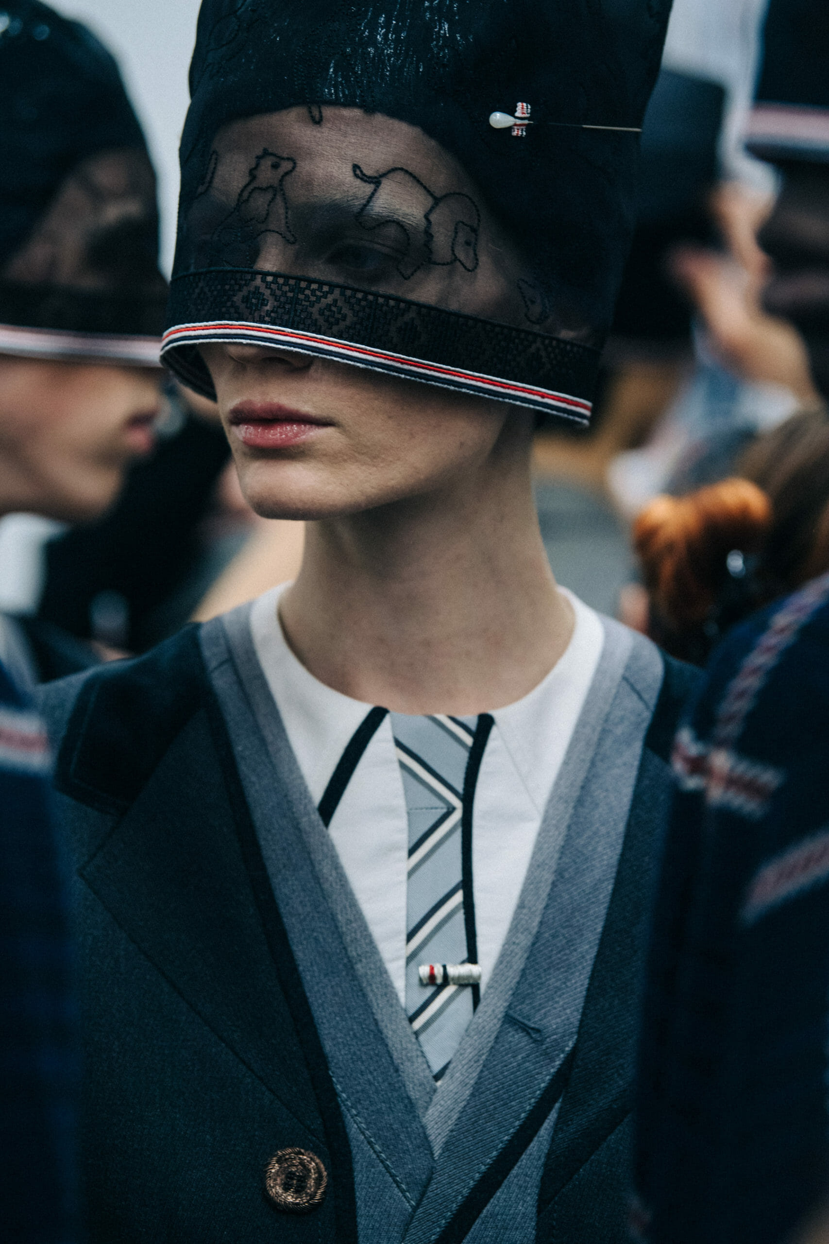 Models wearing Thom Browne suits