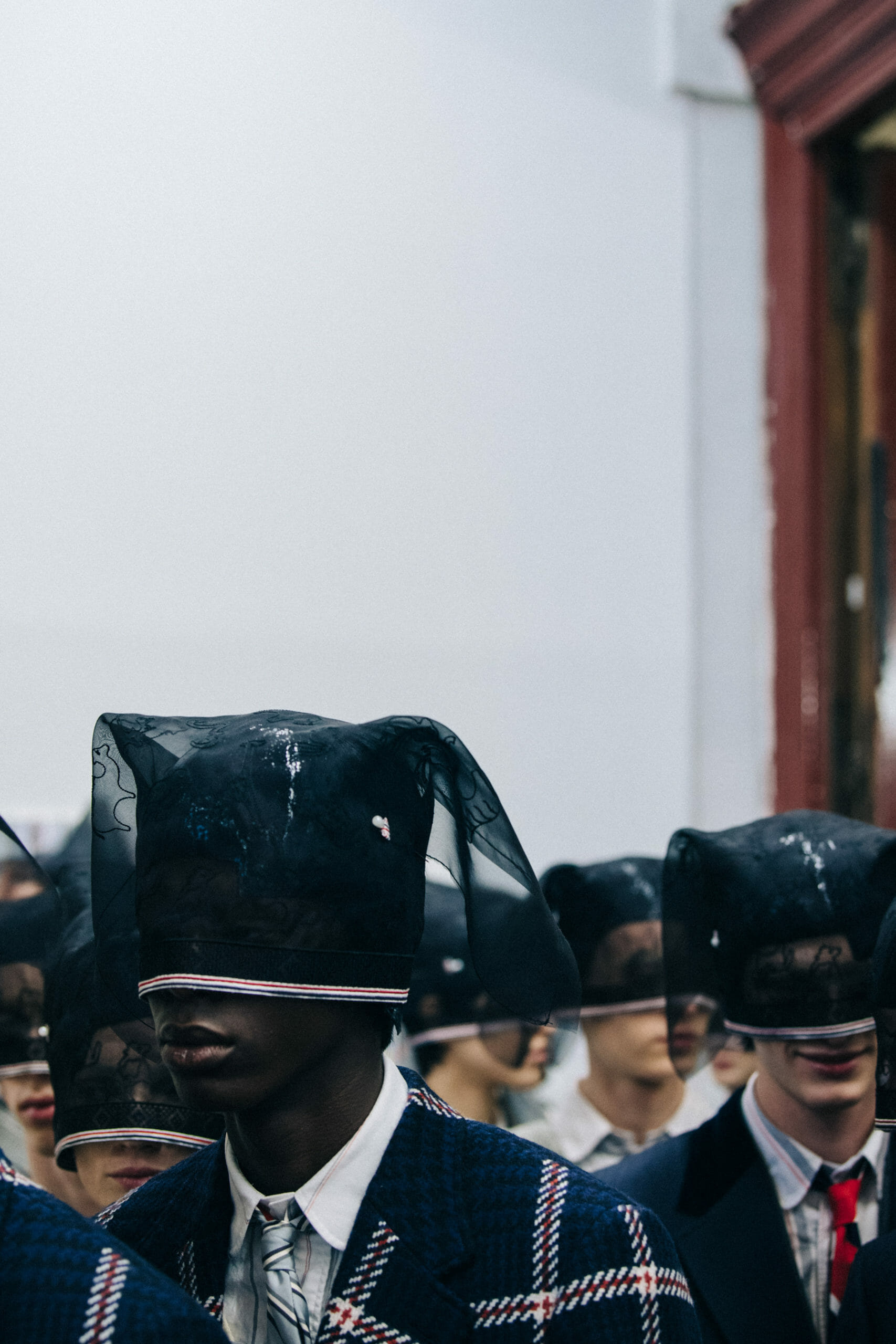 Models wearing Thom Browne suits