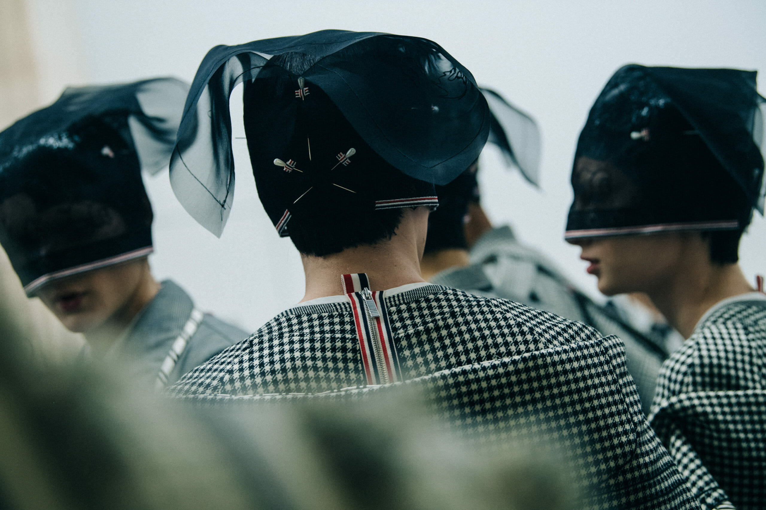 Models wearing Thom Browne suits